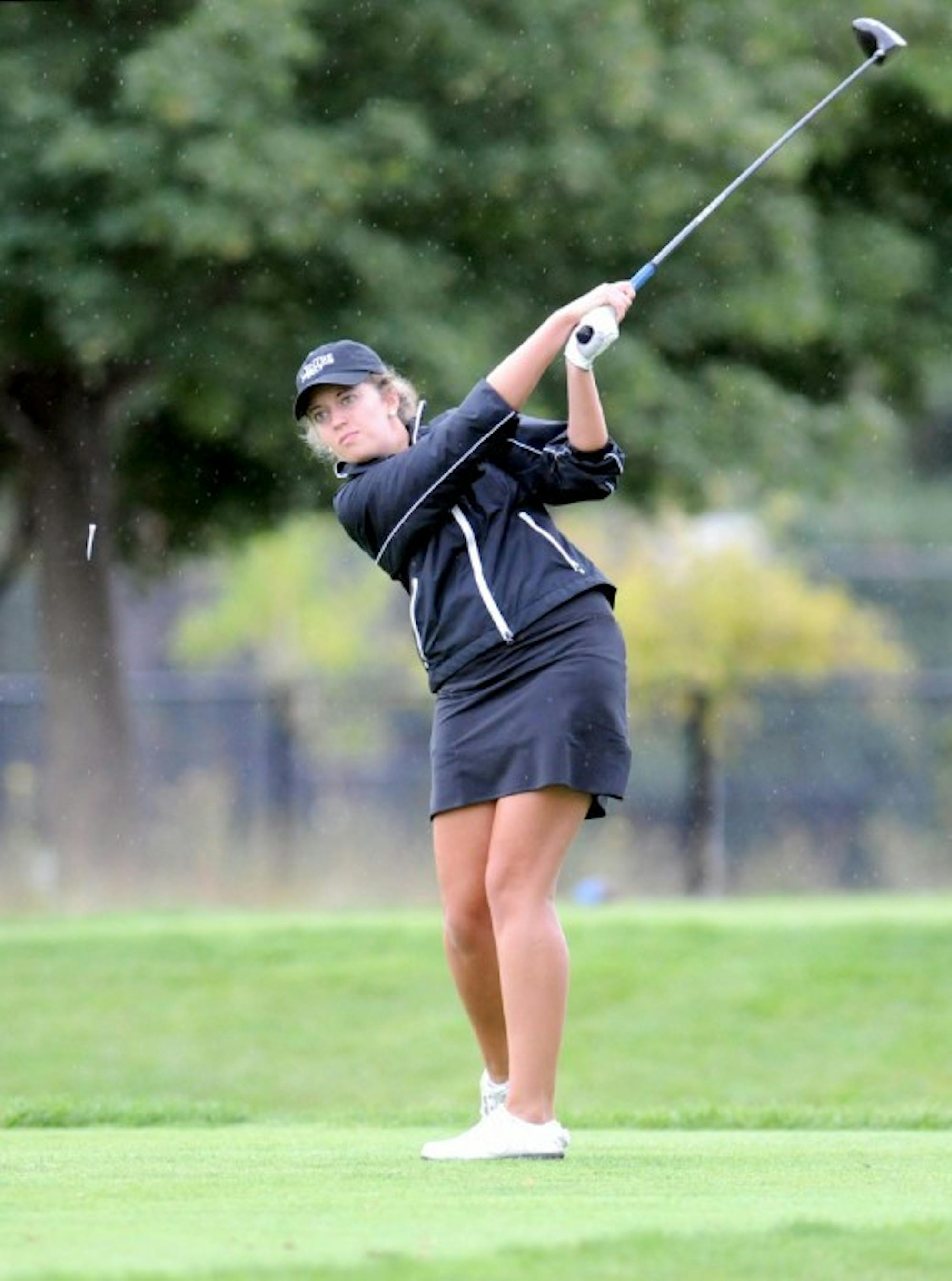 Saint Mary's senior Paige Pollak tees off during the O'Brien National Invitational at Warren Golf Course on Sept. 15.