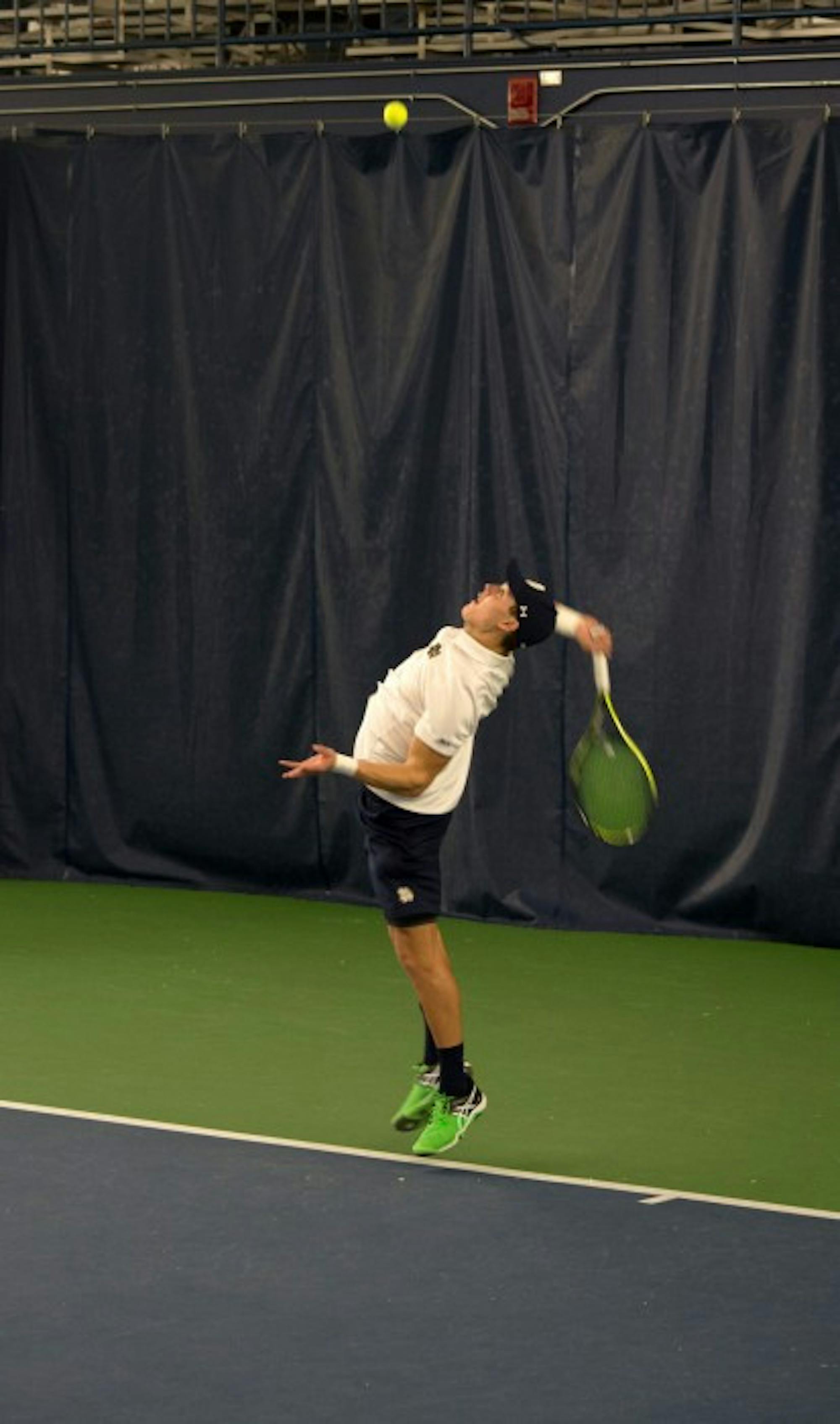 Irish sophomore Brendon Kempin serves during Notre Dame’s 7-0 victory over Ball State on Feb. at Eck Tennis Pavilion.