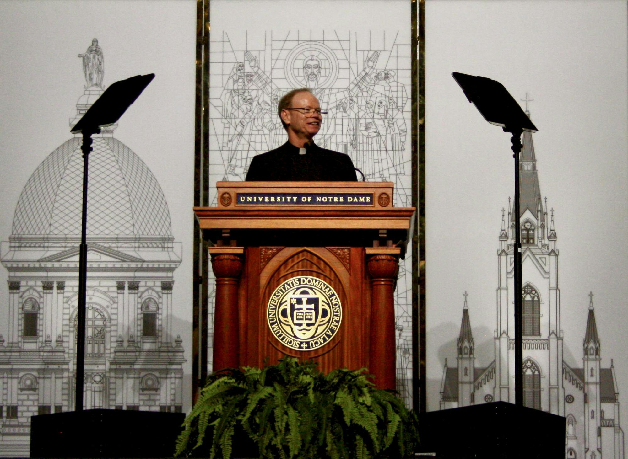 University President directs speech to juniors and their families during JPW
