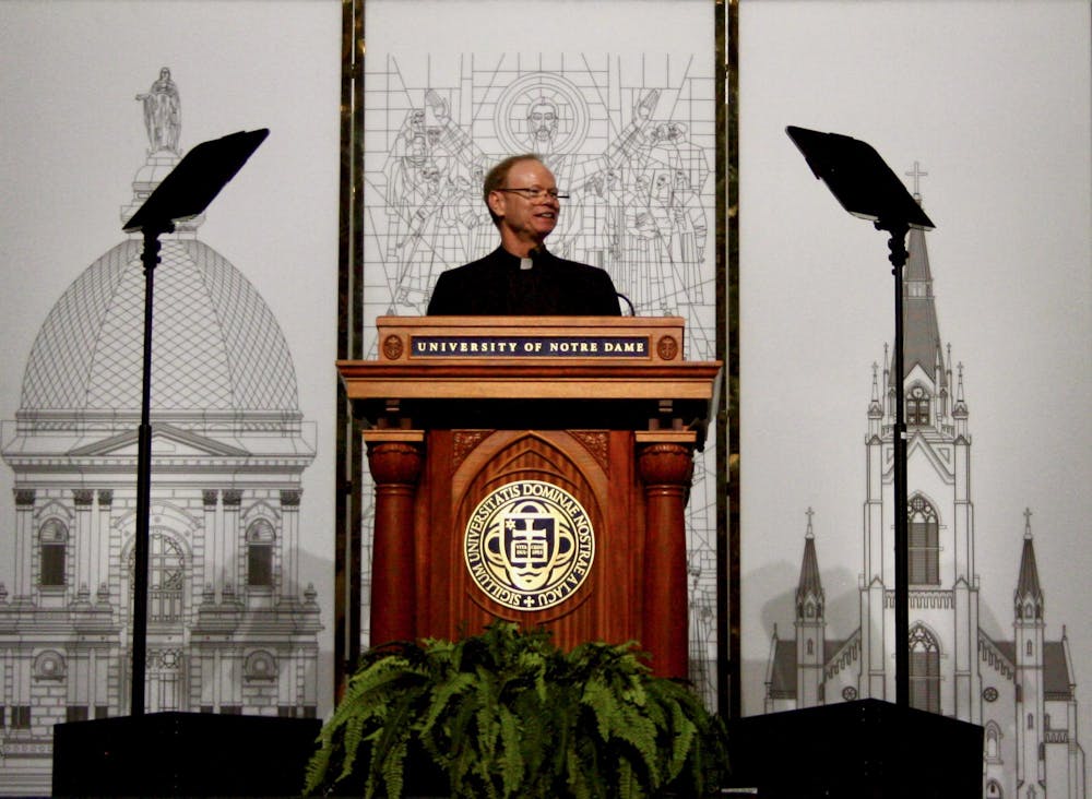 University President directs speech to juniors and their families during JPW