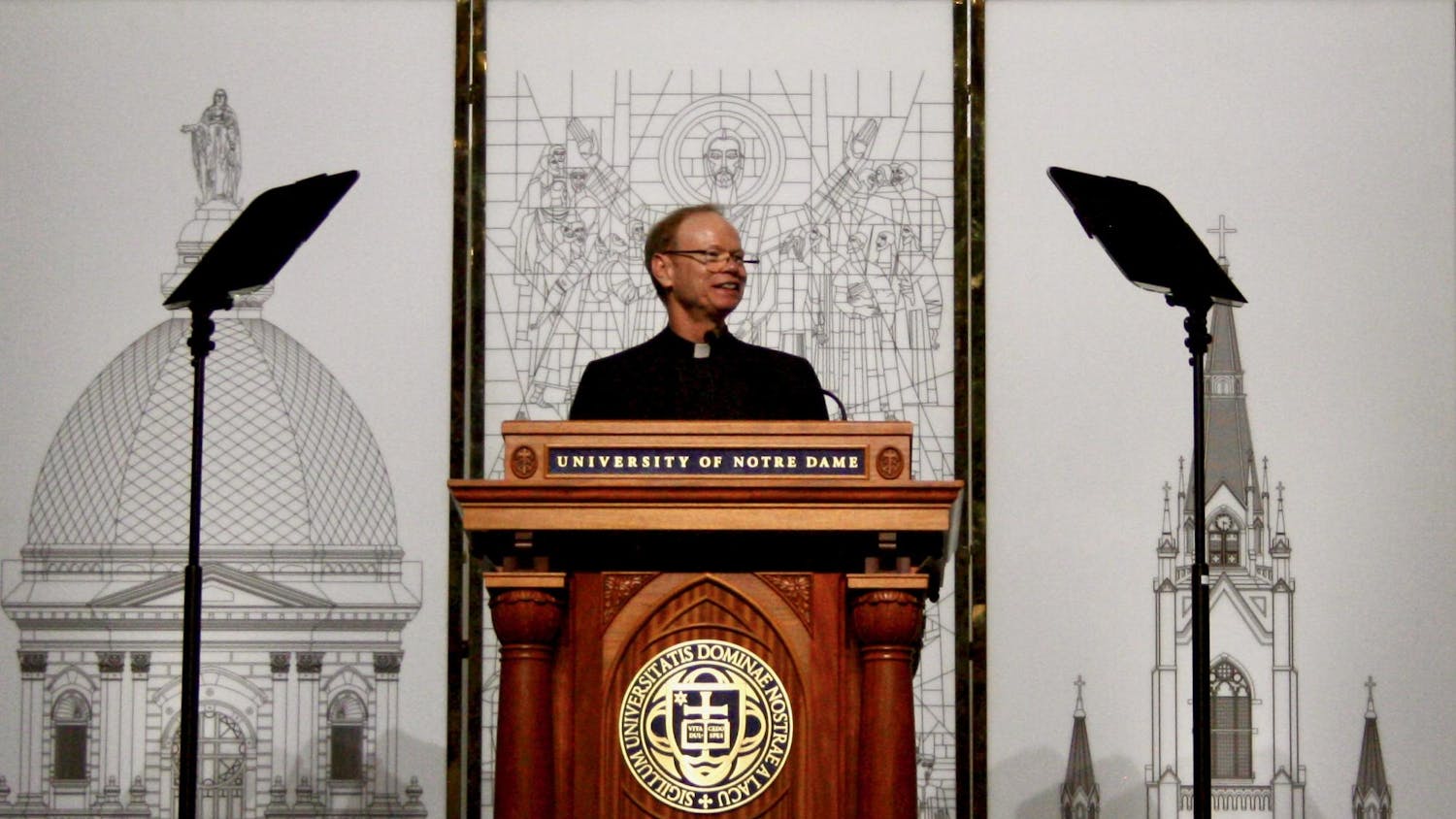 University President directs speech to juniors and their families during JPW