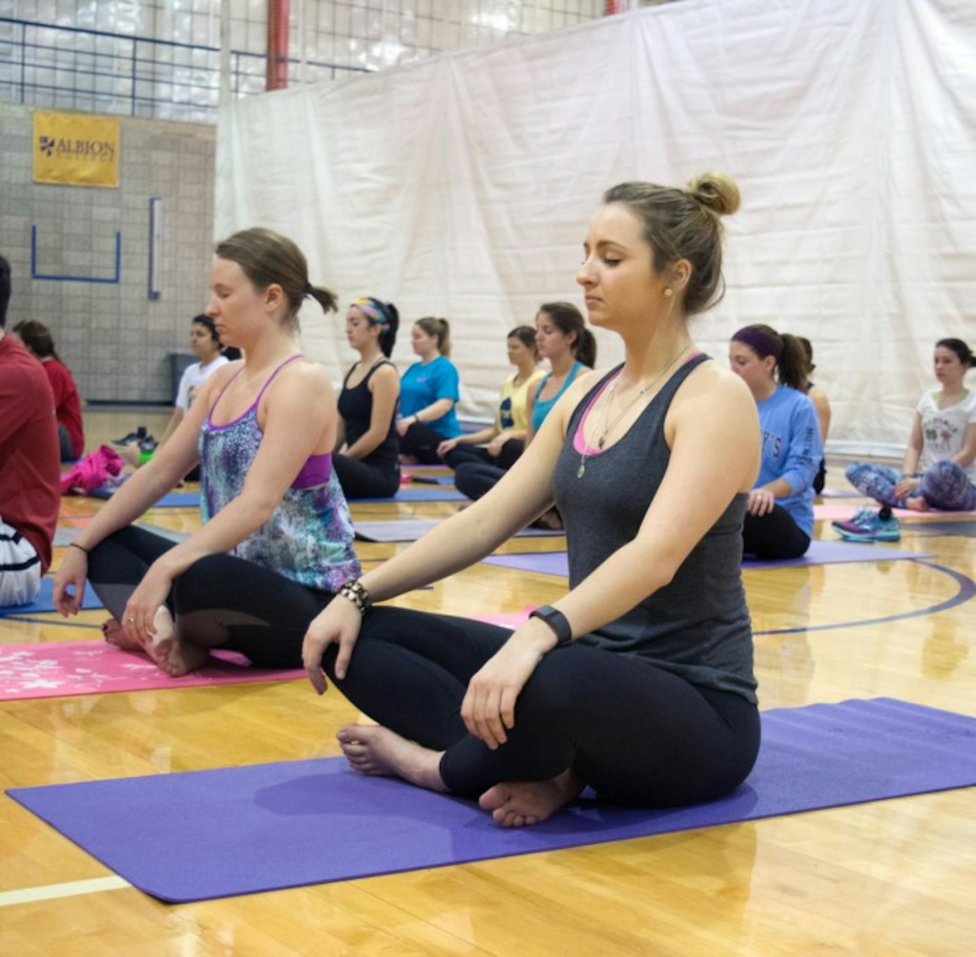 Saint Mary’s students attend a yoga class on Sunday. All proceeds from the event were donated to the Riley Hospital for children.