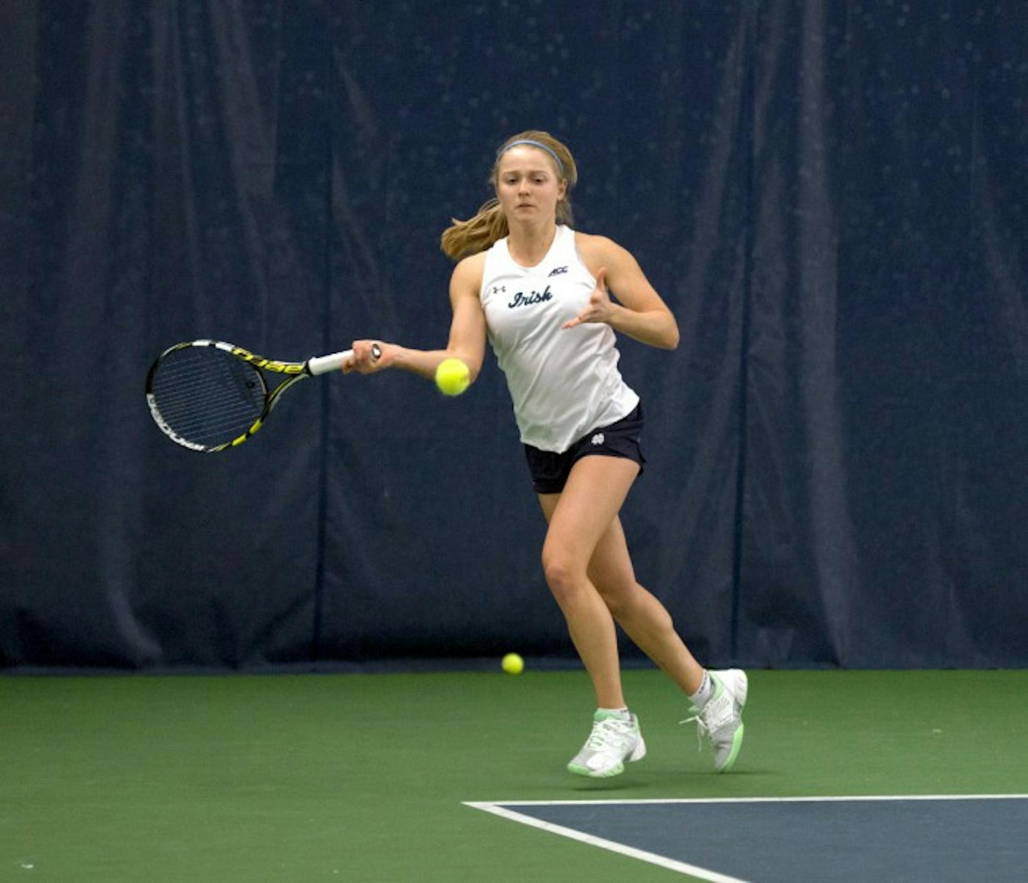 Notre Dame sophomore Monica Robinson winds up for a hit during a match against Stanford on Feb. 6 at Eck Tennis Pavilion. The Irish fell to the Cardinal, 6-1.