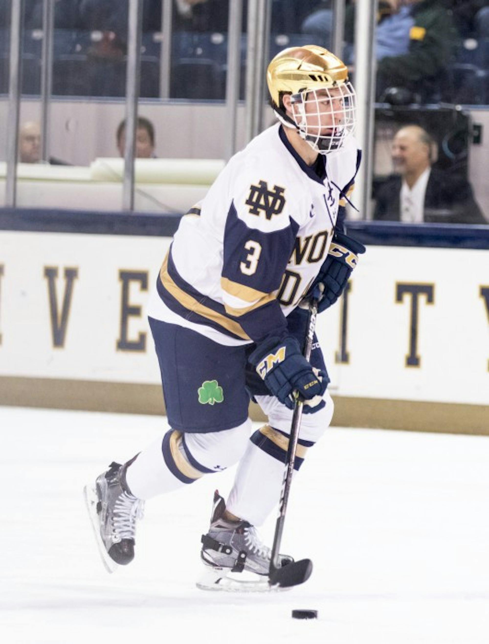 Irish junior defenseman Jordan Gross moves the puck up the Ice in Notre Dame's 4-2 loss to UConn on Oct. 27.