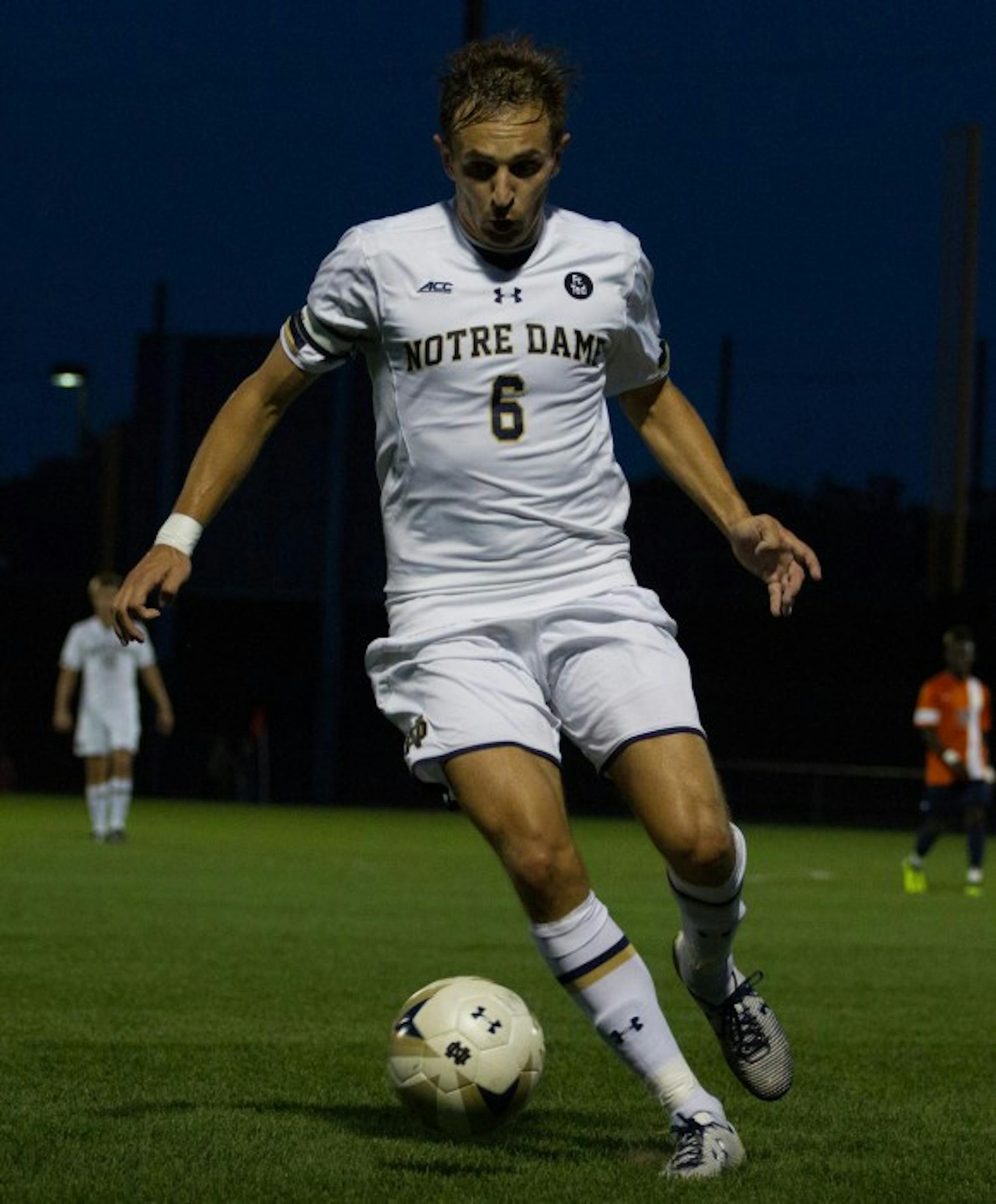 Irish graduate defender Max Lachowecki controls the ball during Notre Dame’s 3-1 win over Virginia on Friday at Alumni Stadium.