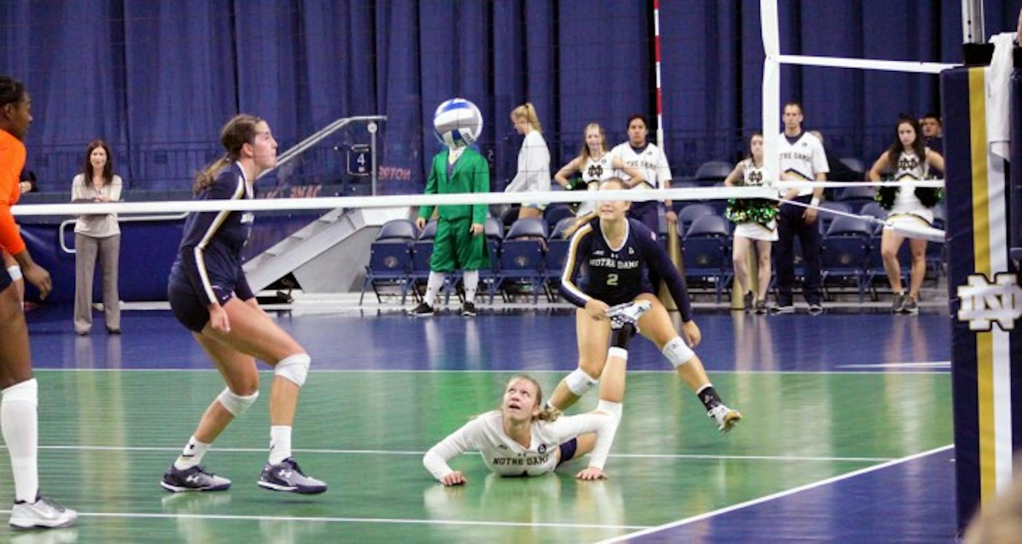 Irish freshman libero Ryann DeJarld completes a dig during Notre Dame’s 3-2 loss to Syracuse on Oct. 4 at Purcell Pavilion.