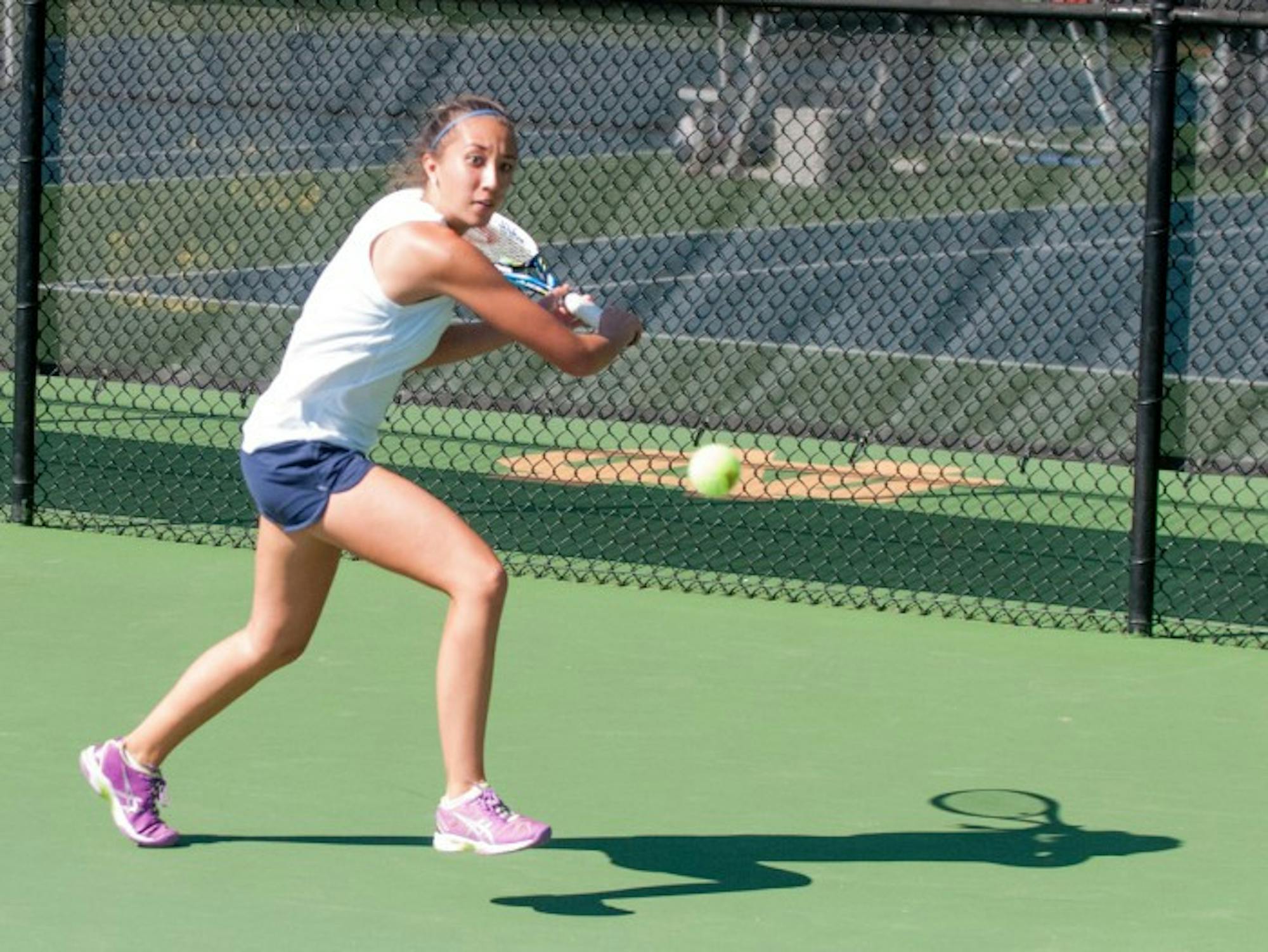 Irish junior Julie Vrabel prepares to return a shot during a match in the Notre Dame Invitational this weekend. Vrabel won one singles match in the invitational.