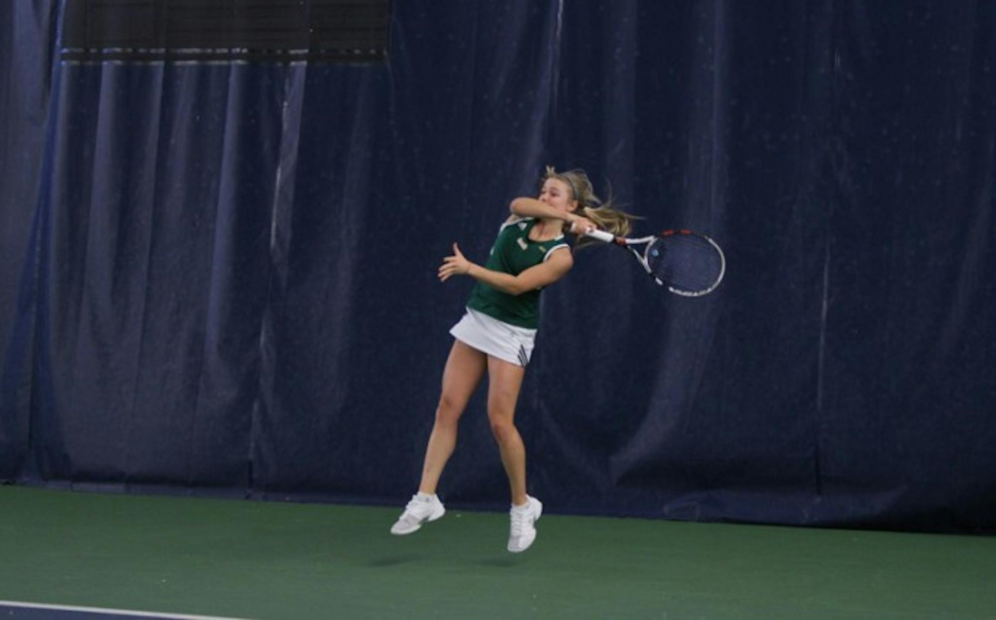 Freshman Monica Robinson returns a hit against Georgia Tech on Friday. Robinson picked up a singles win against Yellow Jackets freshman Rasheeda McAdoo in the 4-3 Irish loss.