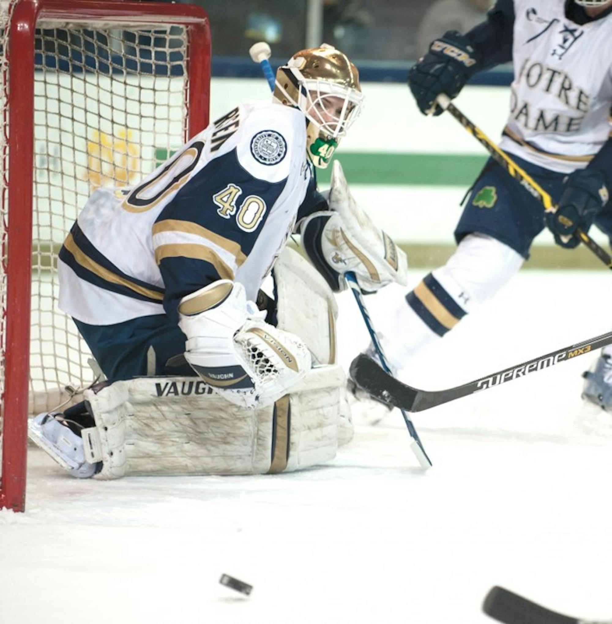 Irish freshman goaltender Cal Petersen watches a puck sail by in Notre Dame’s 5-2 loss to New Hampshire on Jan. 30.
