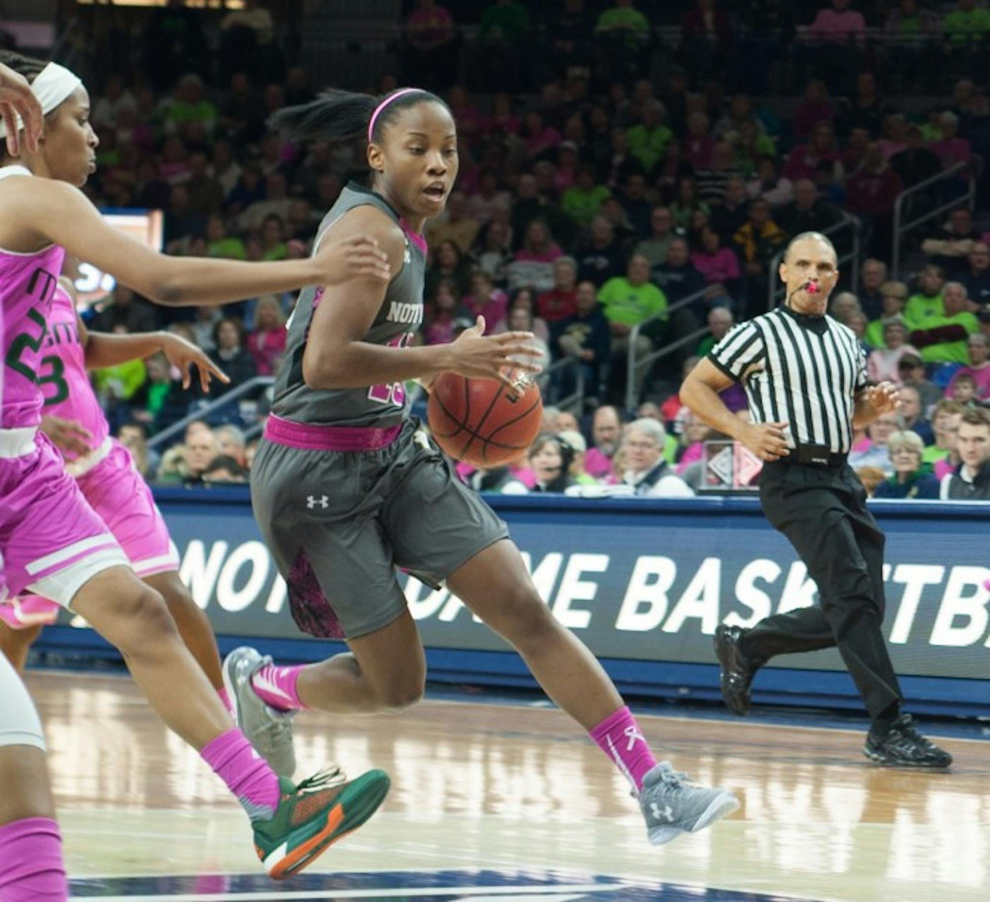 Irish guard Lindsay Allen drives the lane during Notre Dame’s 90-69 win over Miami (Fla.) on Sunday at Purcell Pavilion.