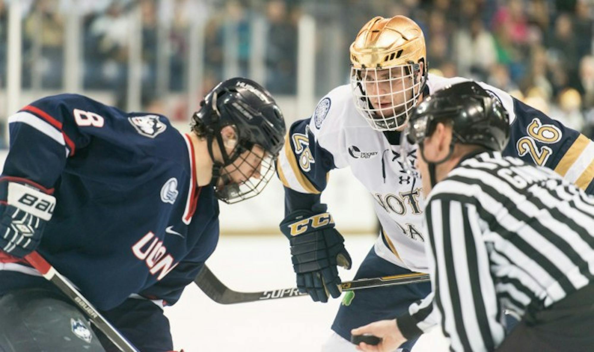 Senior center and team captian Steven Fogarty readies for a faceoff during a 3-3 tie against Hockey East foe Uconn on Jan. 16 at Compton Family Ice Arena. The team will skate with Uconn again this weekend.