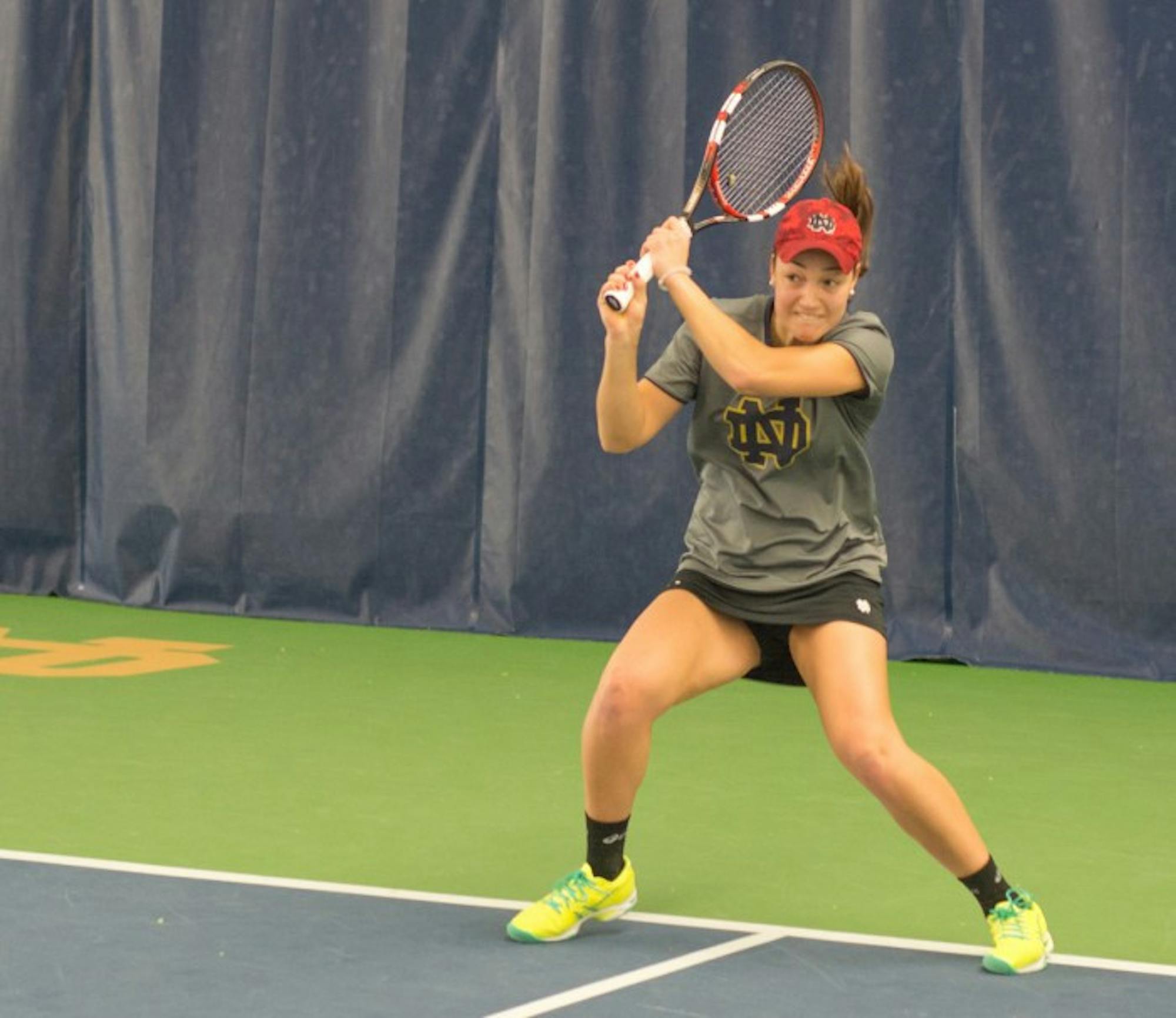 Senior Quinn Gleason returns a shot during Notre Dame’s 6-1 victory over Indiana at Eck Tennis Pavilion on Feb. 20.