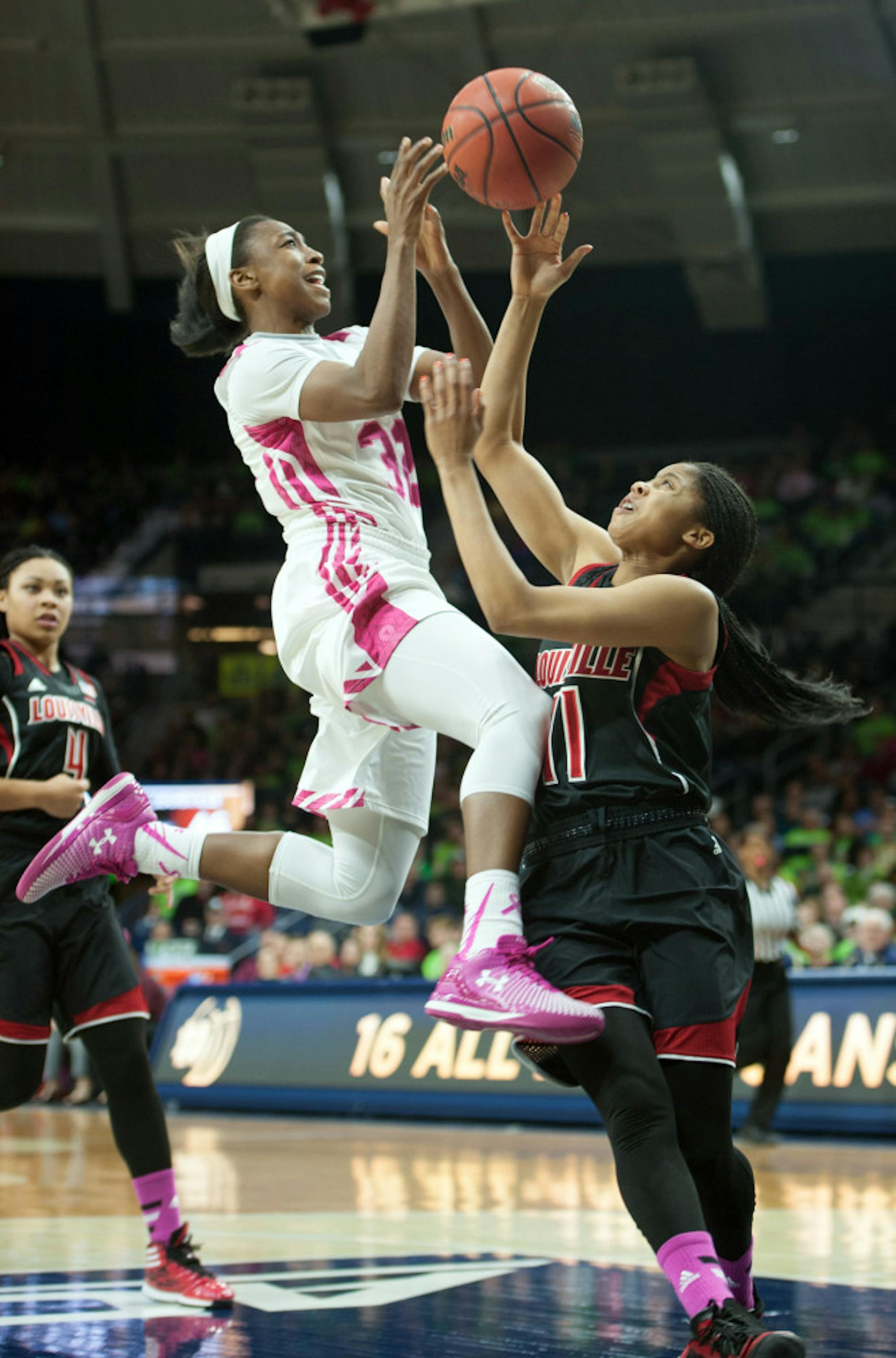 Irish junior guard Jewell Loyd leaps for a layup during a home win Monday against Louisville.