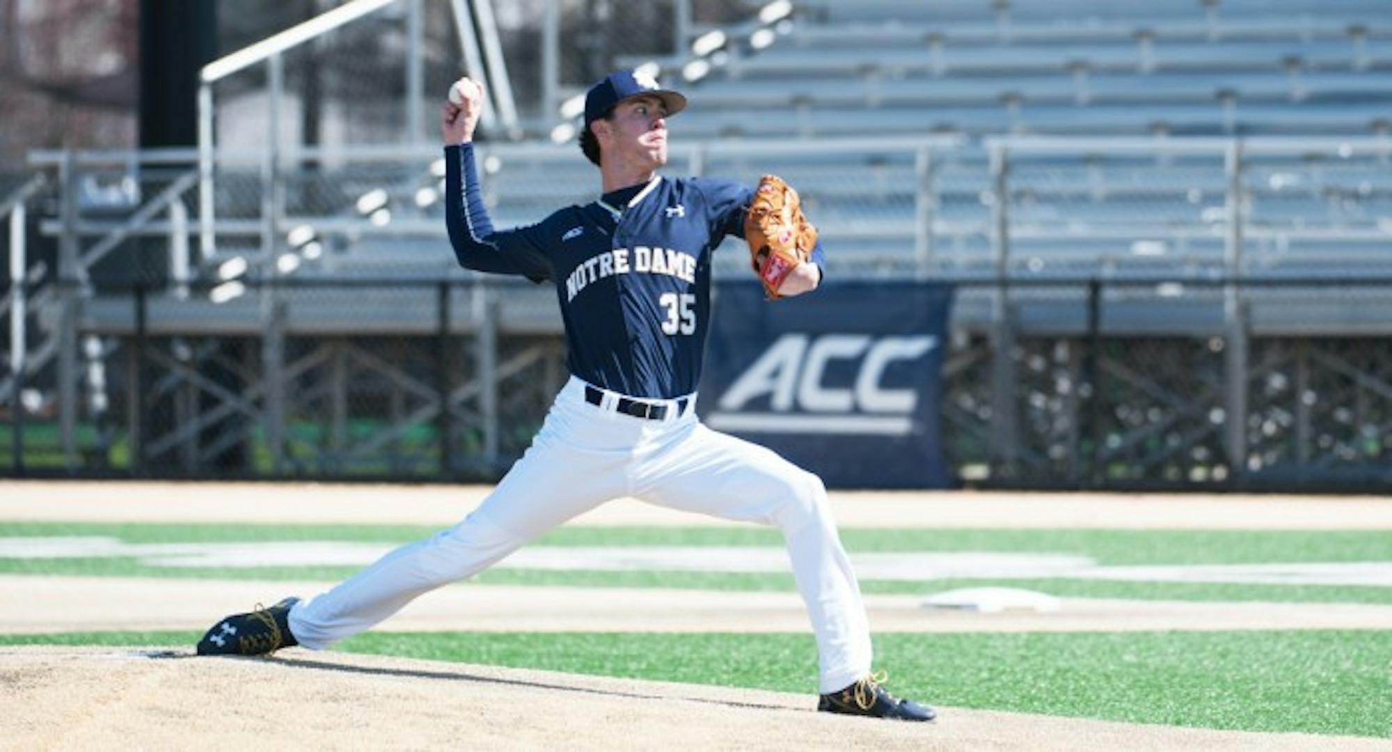 Junior pitcher Peter Solomon delivers a pitch during Notre Dame’s 10-2 victory over Wake Forest on Sunday at Frank Eck Stadium.