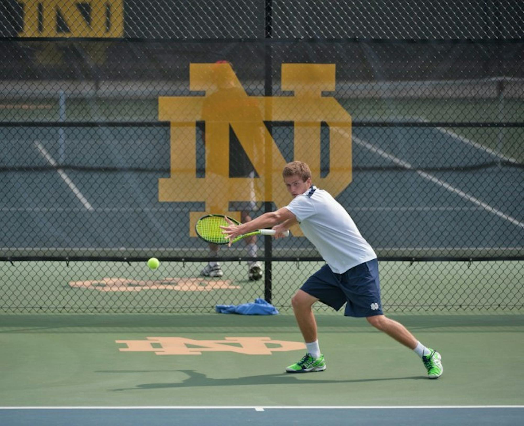 Senior Quentin Monaghan winds up for a hit during a 4-3 victory over North Carolina State on April 18 at Eck Tennis Pavilion.