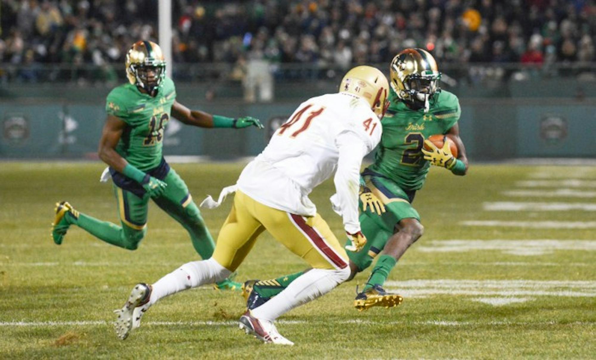 Irish senior receiver Chris Brown looks to avoid a Boston College tackler during Notre Dame’s 19-16 victory over the Eagles on Saturday. Brown finished with six receptions for a career-high 104 yards.