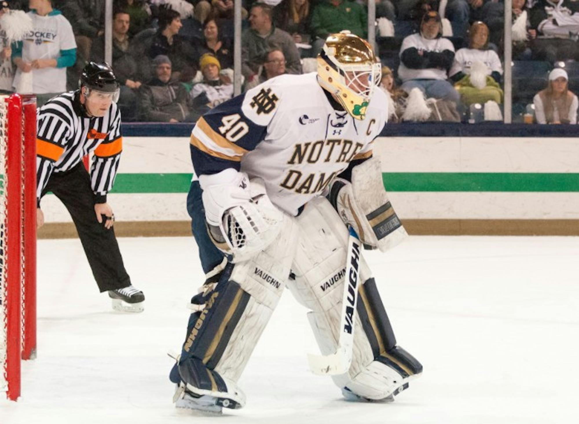 Irish junior goalkeeper Cal Petersen stands in front of the net during Notre Dame's 4-1 victory over Vermont on Feb. 4 at Compton Family Ice Arena.
