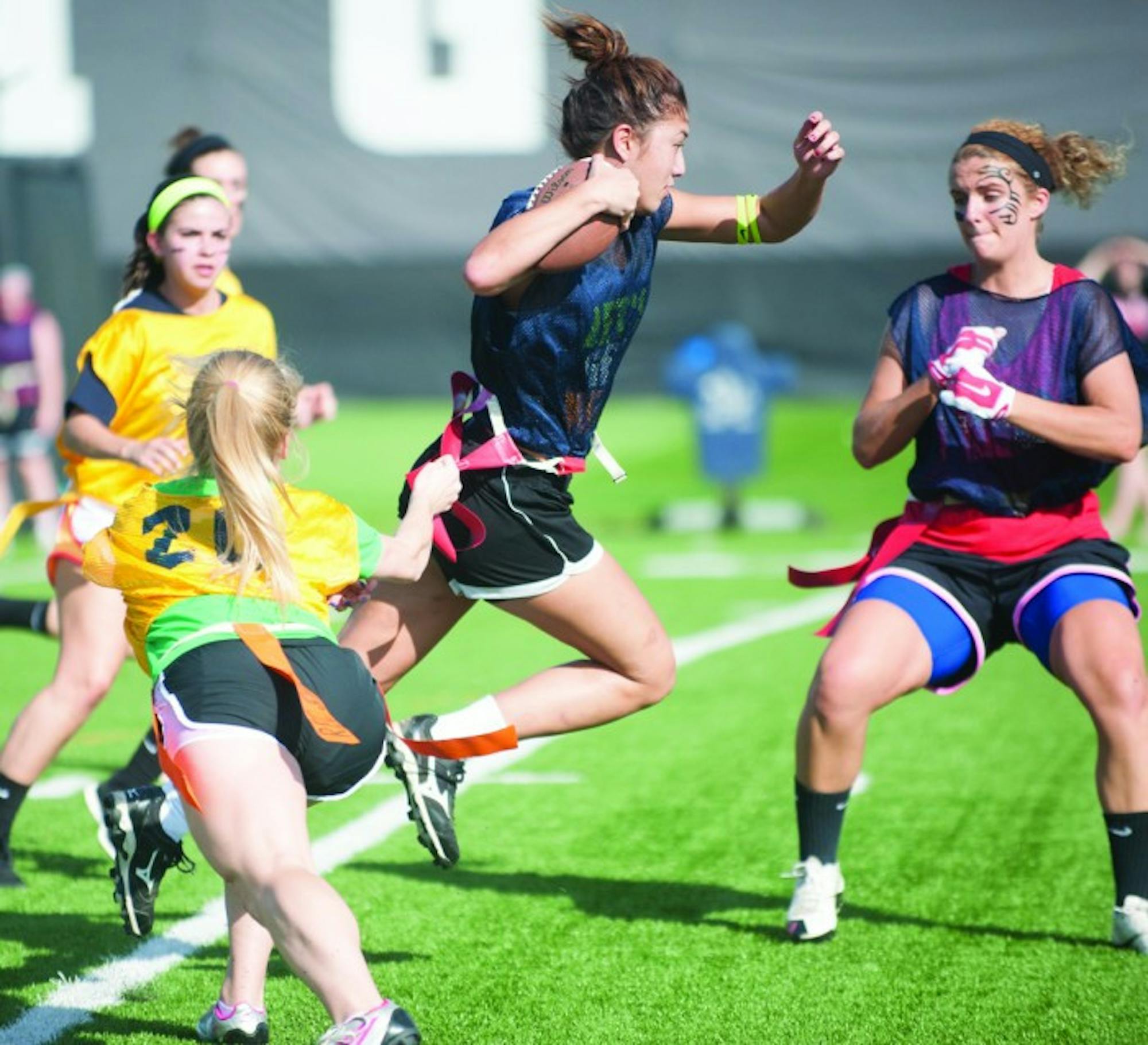 Belles sophomore forward Liza Felix holds off a Trine defender  during the Belles’ 1-0 home win over the Thunder on Oct. 4.