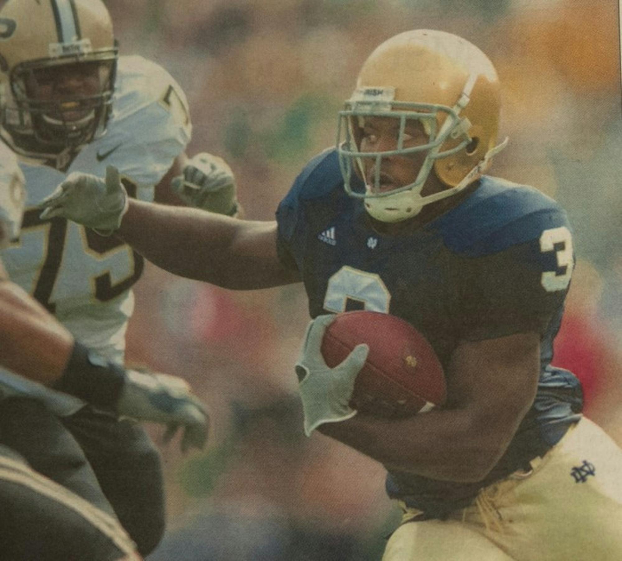 Darius Walker carries the ball for the Irish during a 35-21 win over Purdue on Sept. 30, 2006 at Notre Dame Stadium. The Irish finished the 2006 season, Walker’s last, with a 10-3 record.