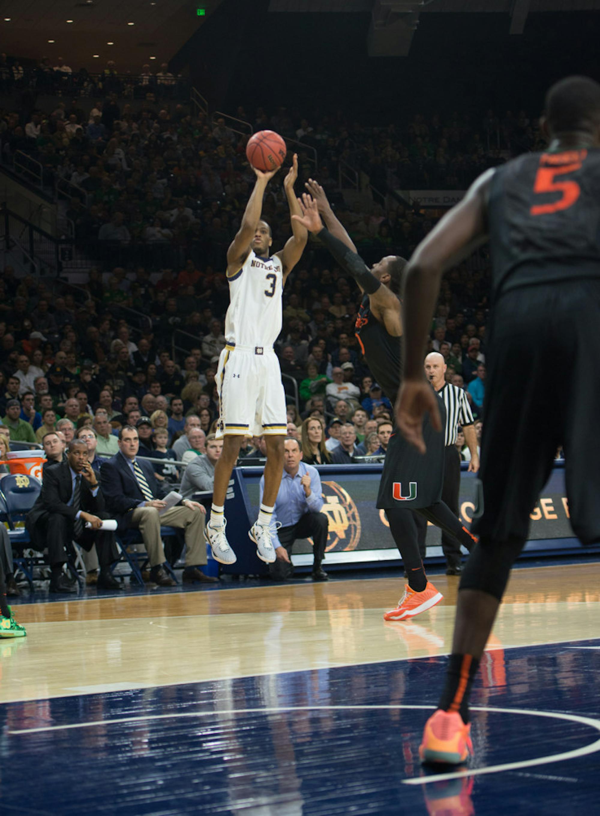 Irish sophomore forward V.J. Beachem shoots a three-pointer during Notre Dame’s 75-70 win over Miami on Saturday at Purcell Pavilion.