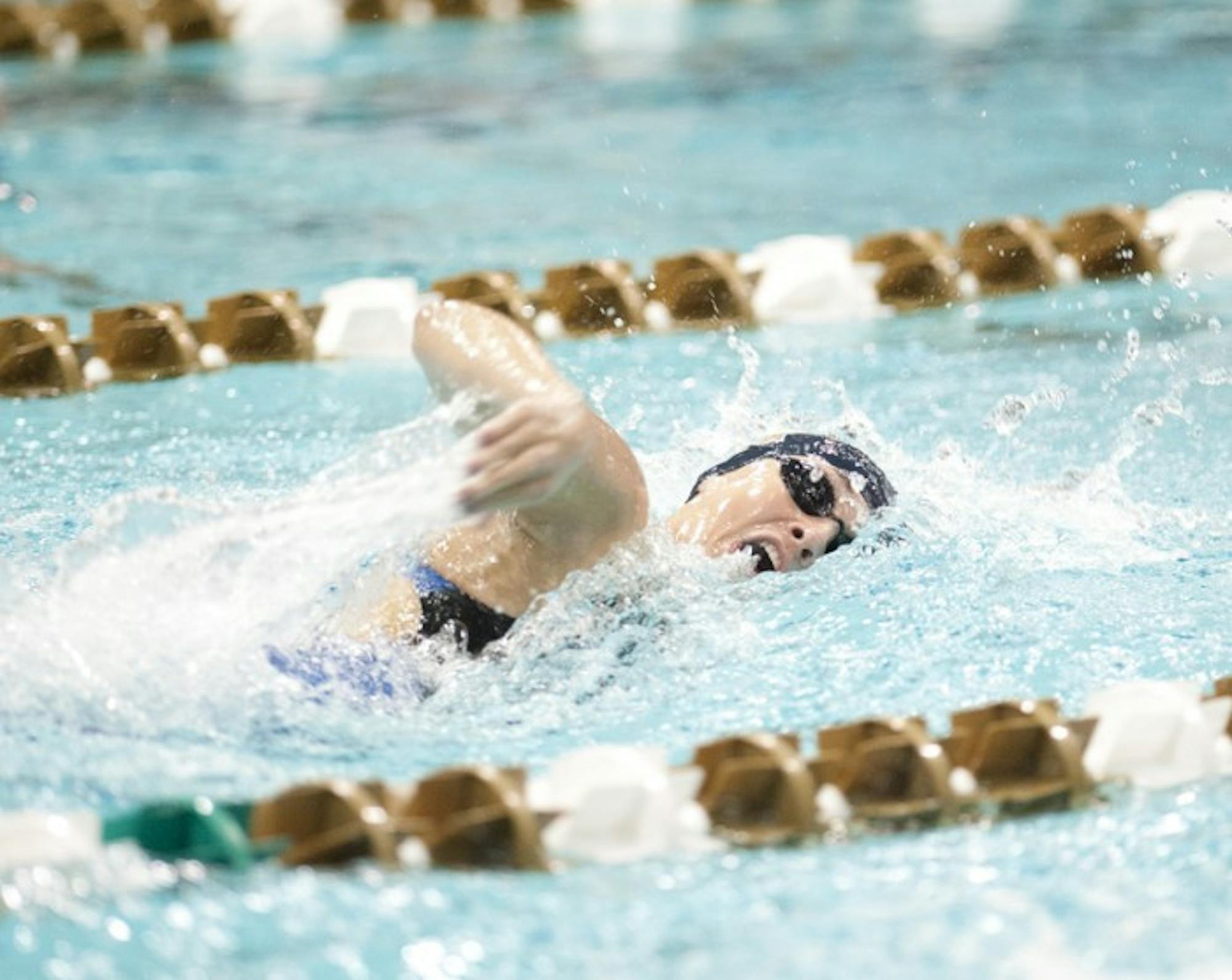 Irish freshman Molly Barry swims the freestyle during the Shamrock Invitational on Jan. 31.