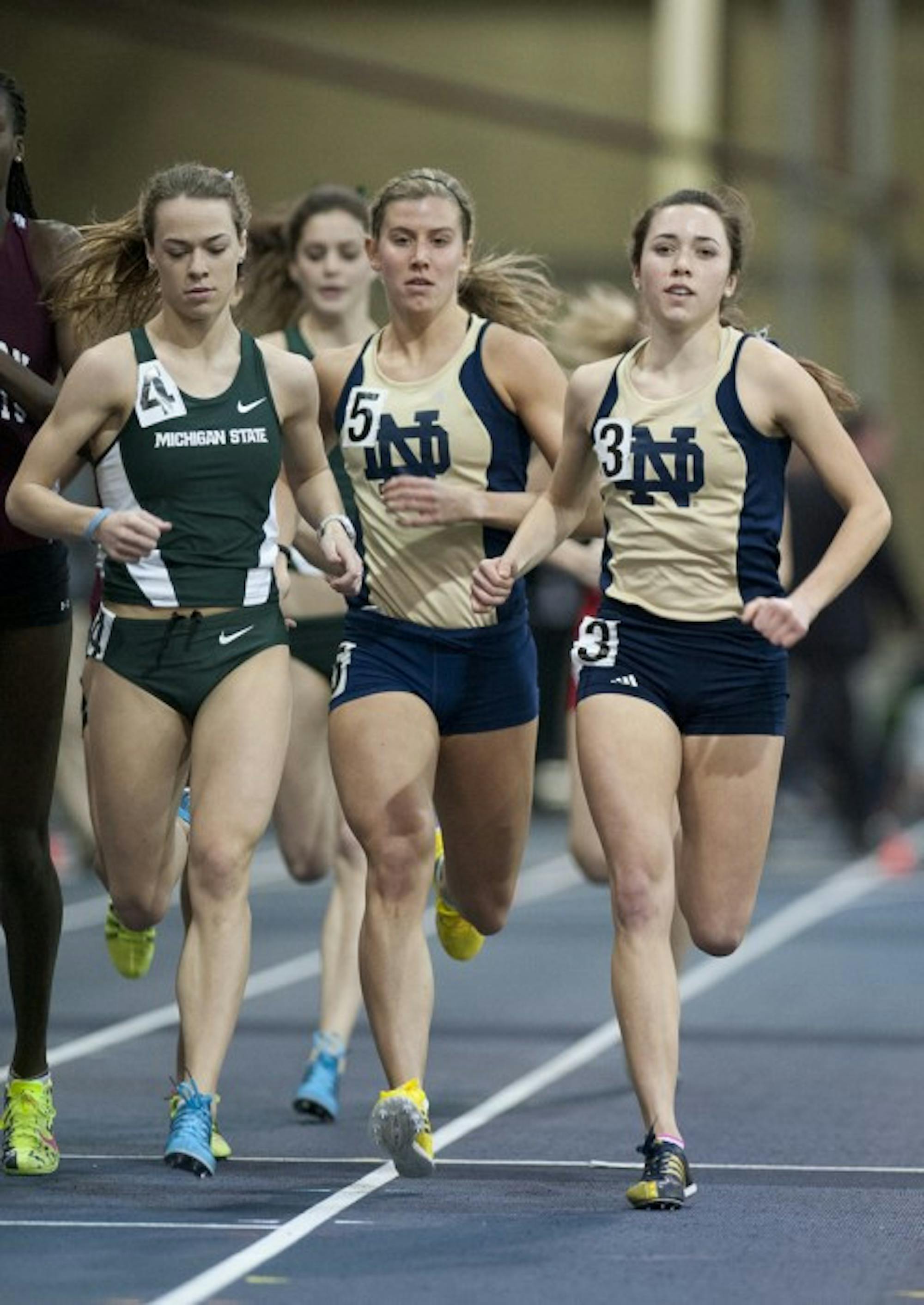 Irish sophomore Danielle Aragon and junior Kaileen Healey push the pace during the 800-meter run during the Notre Dame Invitational on Saturday.