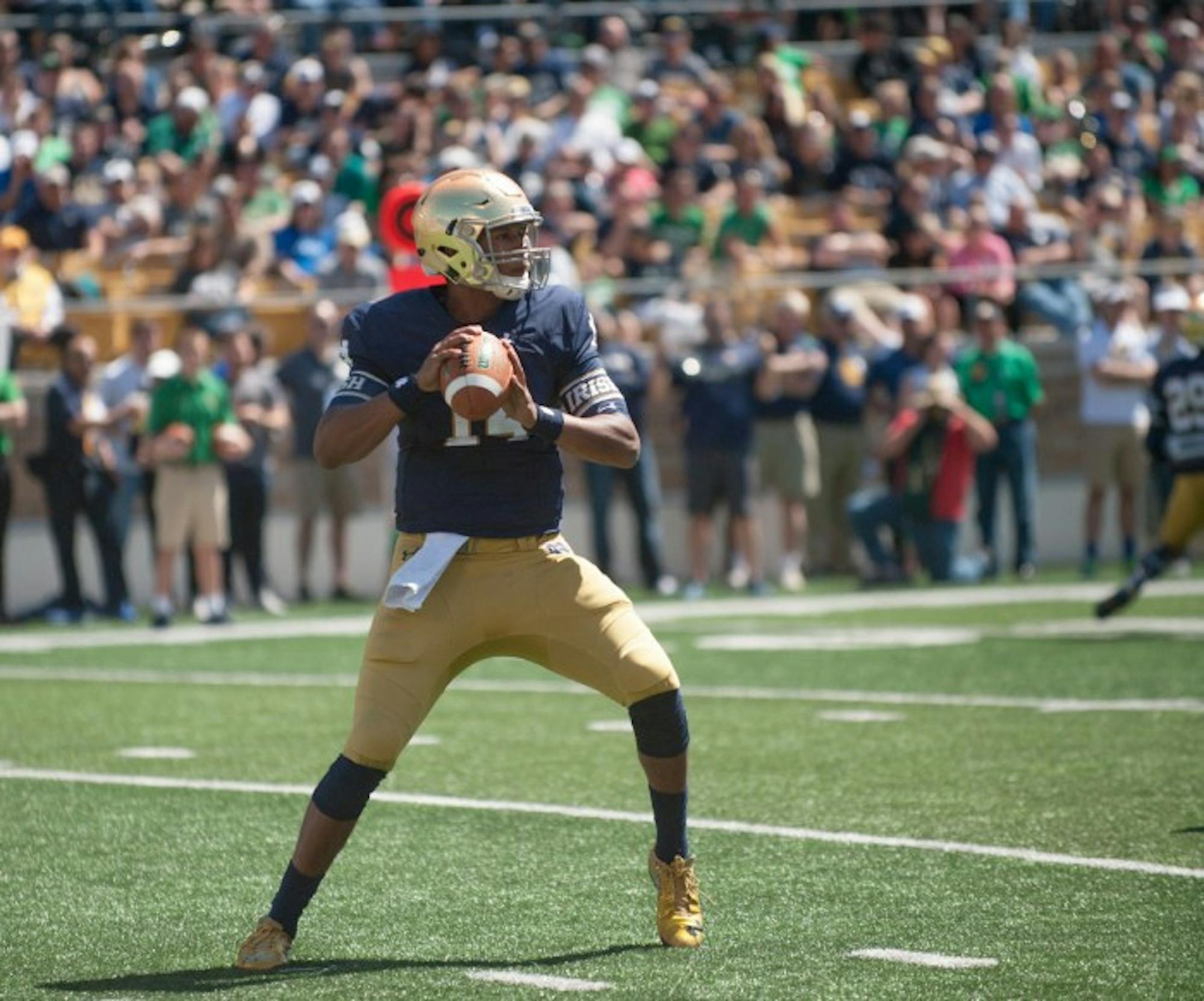 Irish junior quarterback DeShone Kizer drops back to pass during the Blue-Gold Game on Saturday at Notre Dame Stadium.