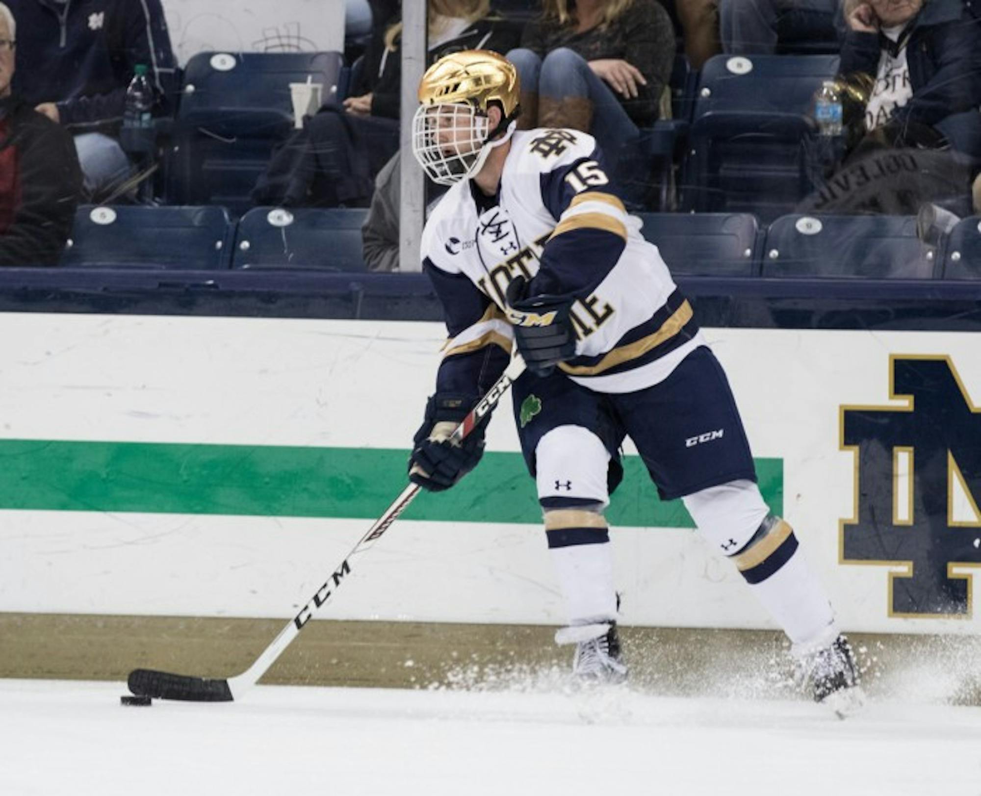 Irish sophomore forward Andrew Oglevie surveys the ice during Notre Dame’s 4-2 loss to UConn on Oct. 27 at Compton Family Ice Arena. Oglevie is second on the team in points scored this season with 15.