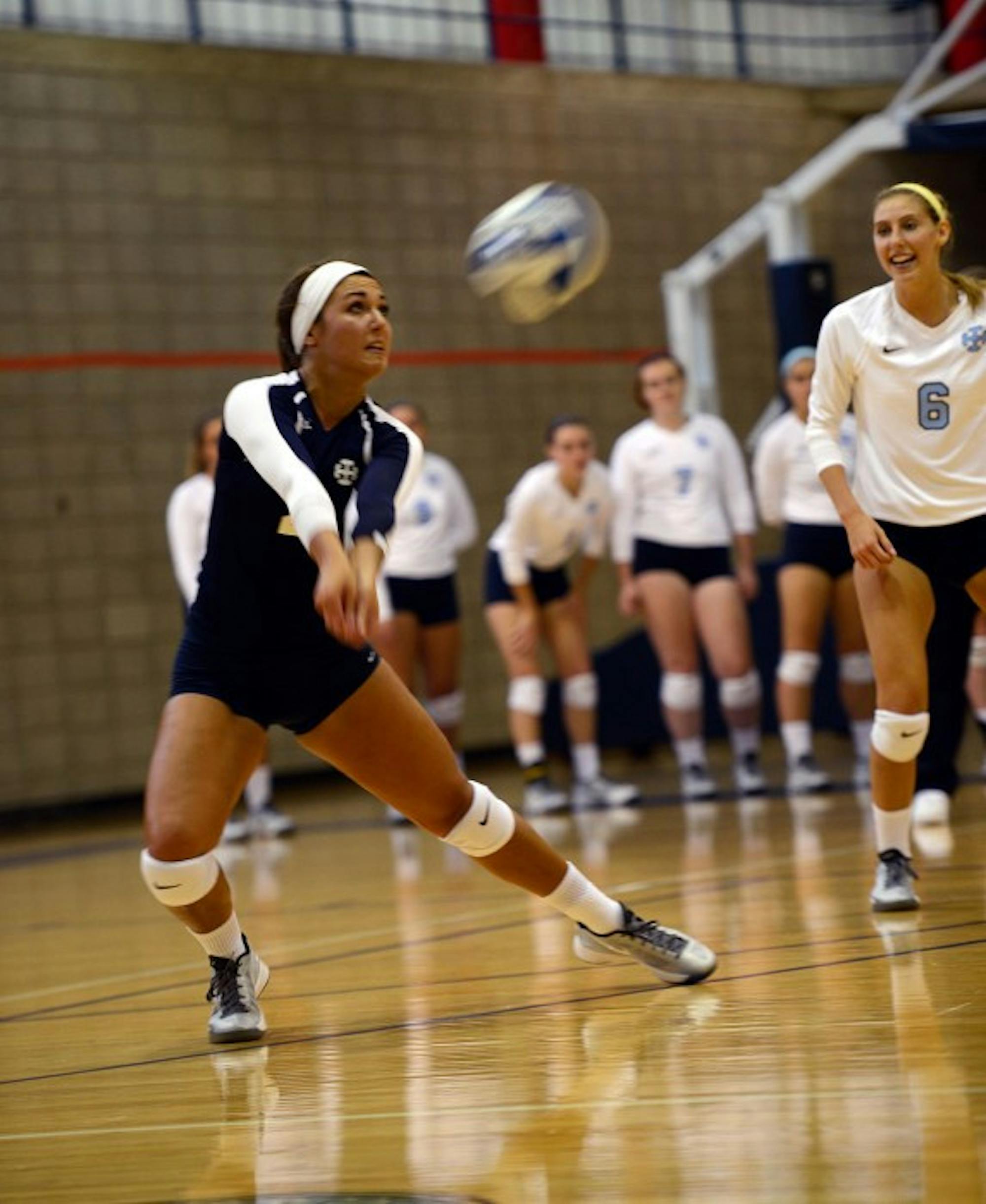Belles sophomore libero McKenzie Todd bumps the ball during Saint Mary’s 3-0 win over Manchester on Sept. 1 at Angela Gym. Todd finished the game with four digs.