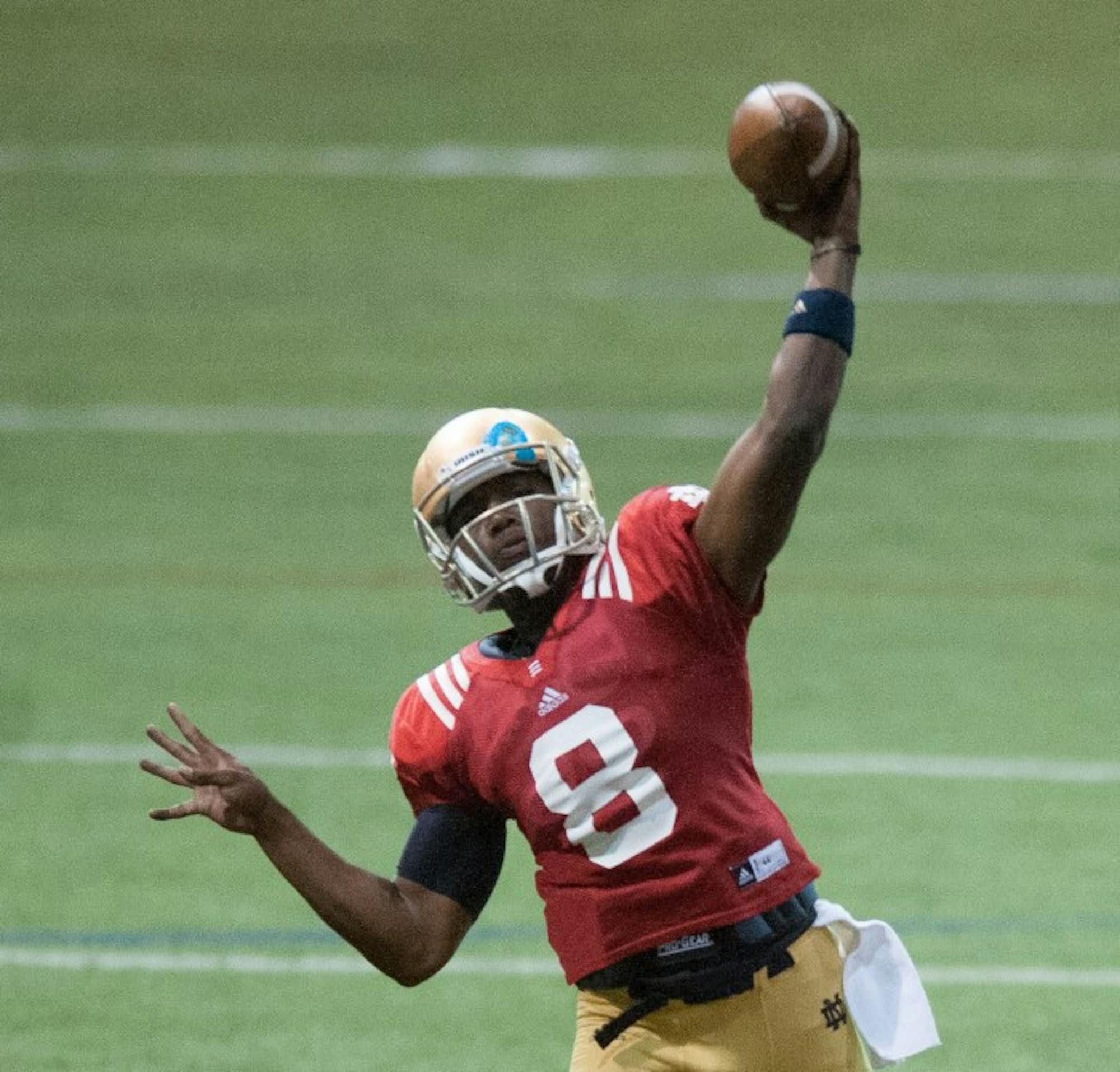 Sophomore quarterback Malik Zaire throws a pass during a Notre Dame spring practice April 13, 2013.