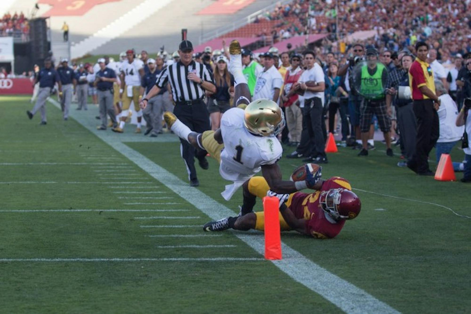 Former Irish running back Greg Bryant attempts to score a touchdown during Notre Dame's 49-14 loss against USC on Nov. 29, 2014, at LA Memorial Coliseum. Bryant was tragically shot on an interstate highway in south Florida on Saturday morning and died a few hours later.