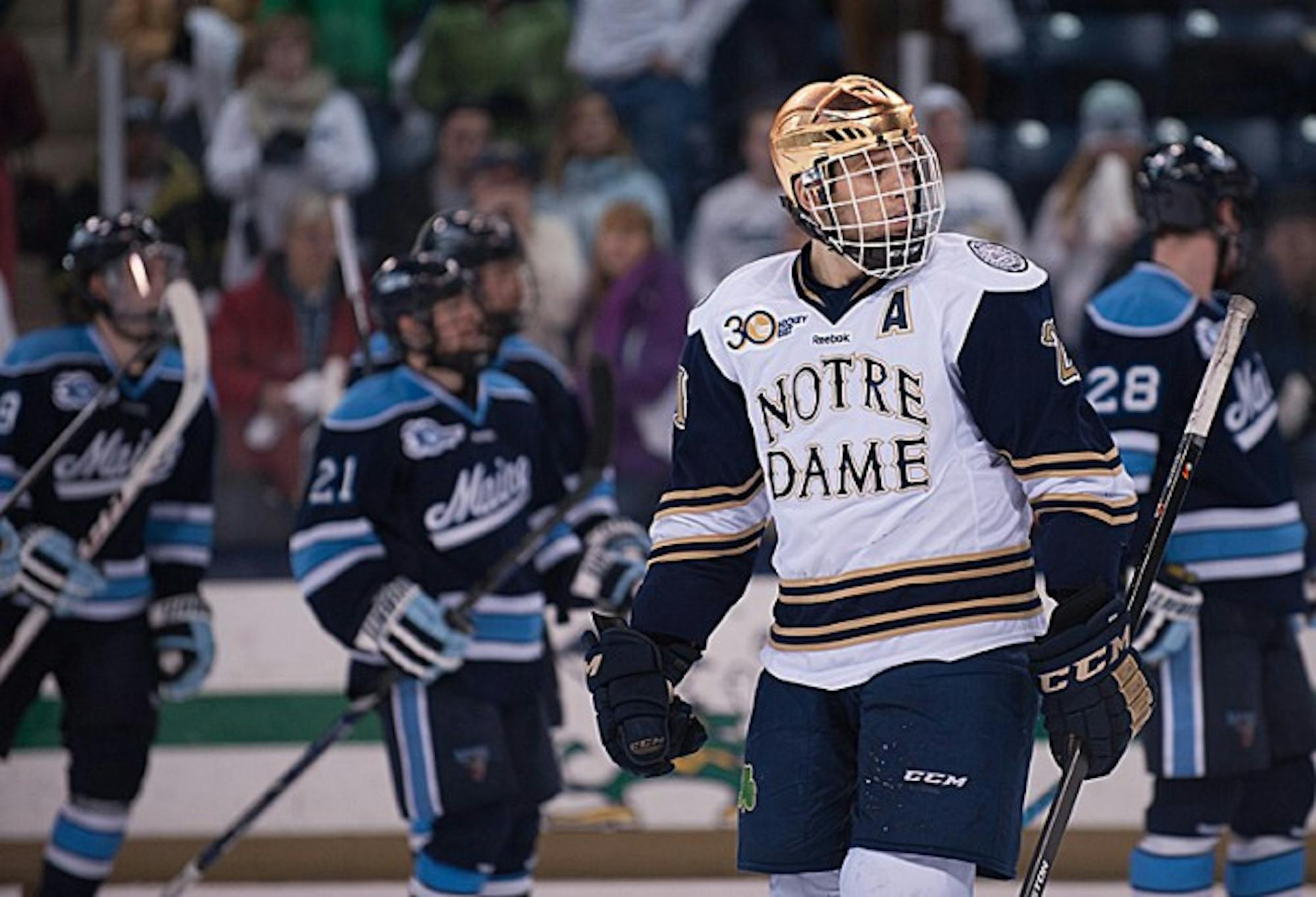 Senior right wing Bryan Rust takes a break during Notre Dame's 2-1 loss to Maine on Friday. Rust scored two goals the next night.