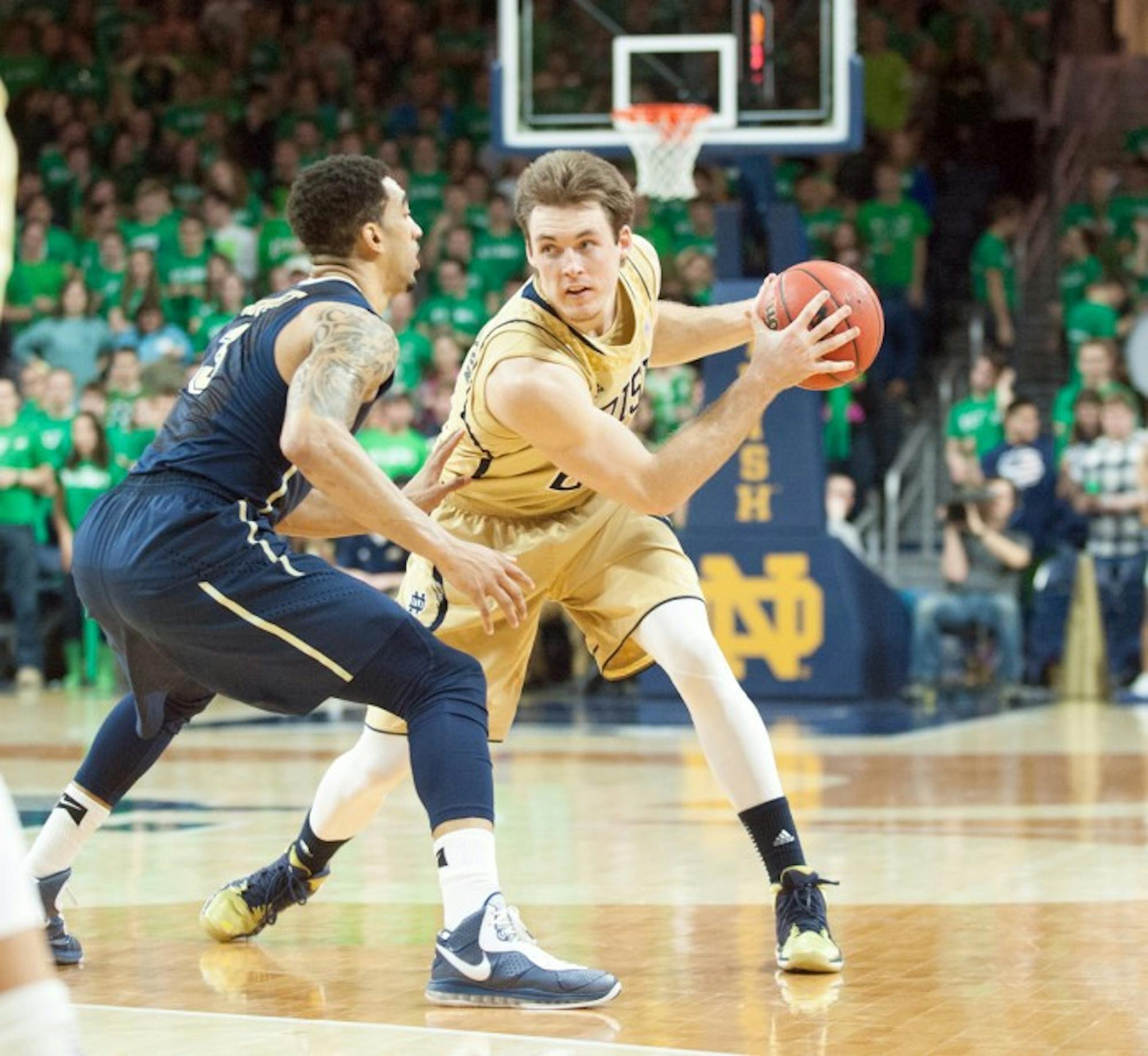 Irish senior forward/guard Pat Connaughton jukes out an opponent during Notre Dame’s 85-81 loss to Pittsburgh on March 1.