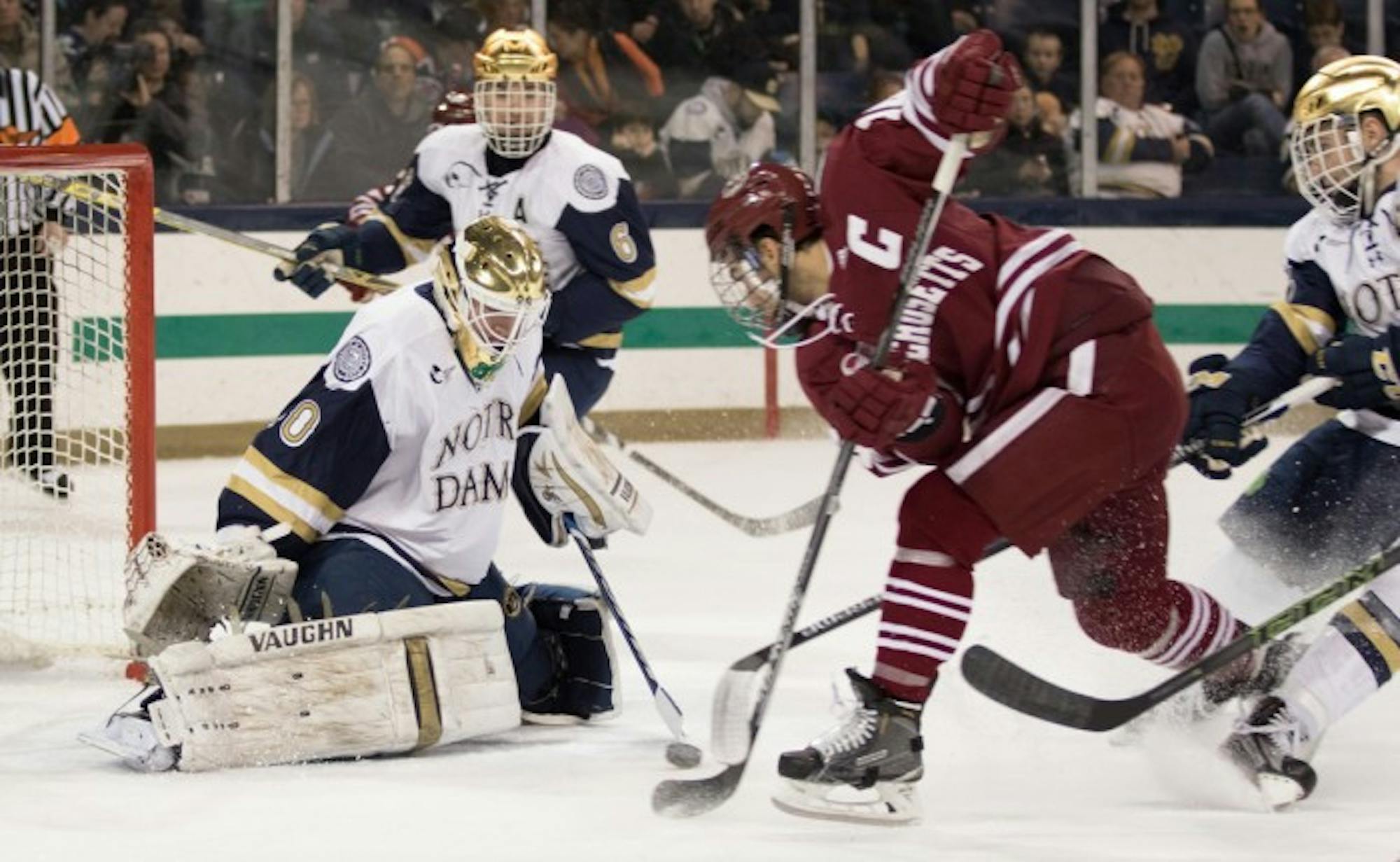 Sophomore goaltender Cal Petersen stops a shot during Notre Dame’s 5-1 home conference win over Massachusetts on Dec. 5.