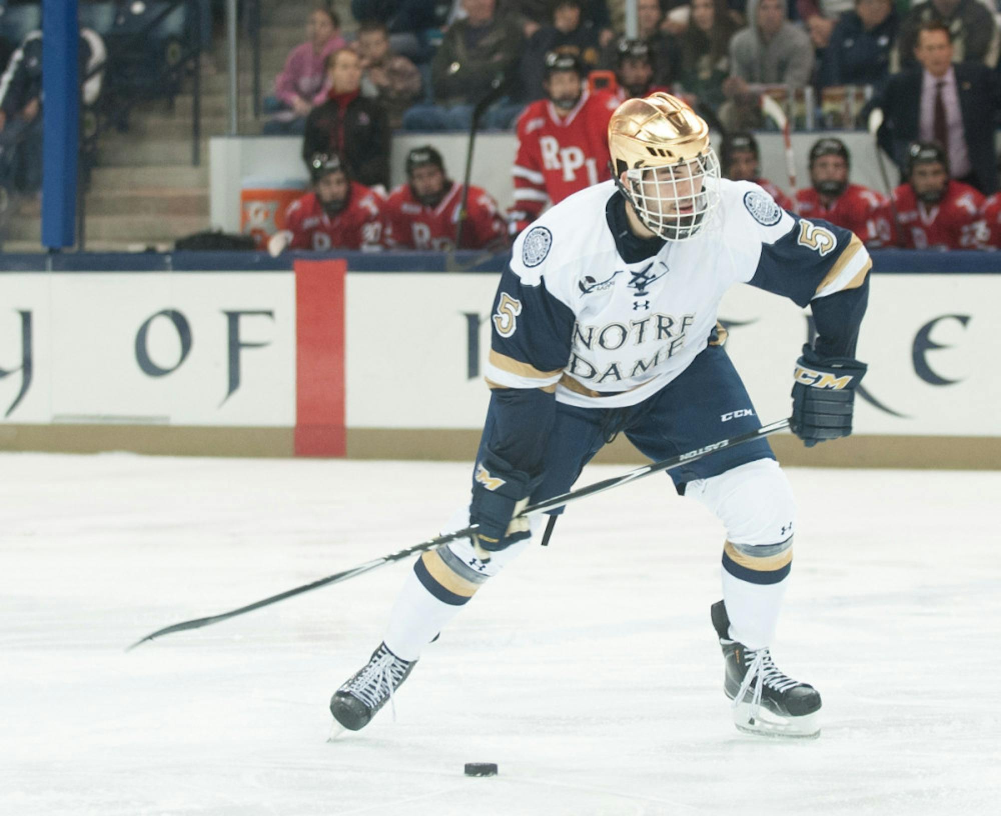 Irish senior defenseman Robbie Russo controls the puck during Notre Dame’s 3-2 loss to Rensselaer on Oct. 10.