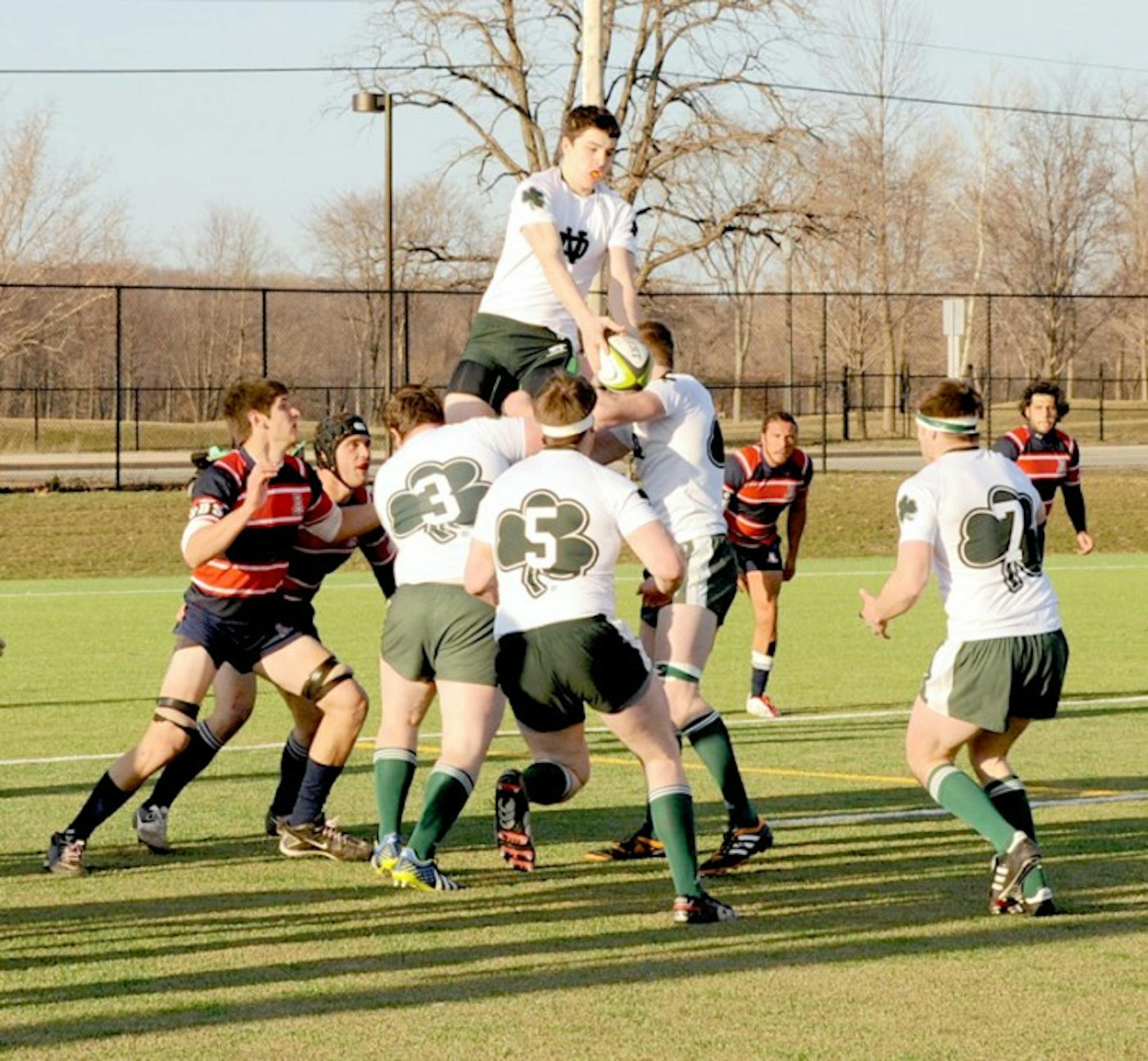 Irish and Arizona rugby players battle for the ball during the Parseghian Cup.