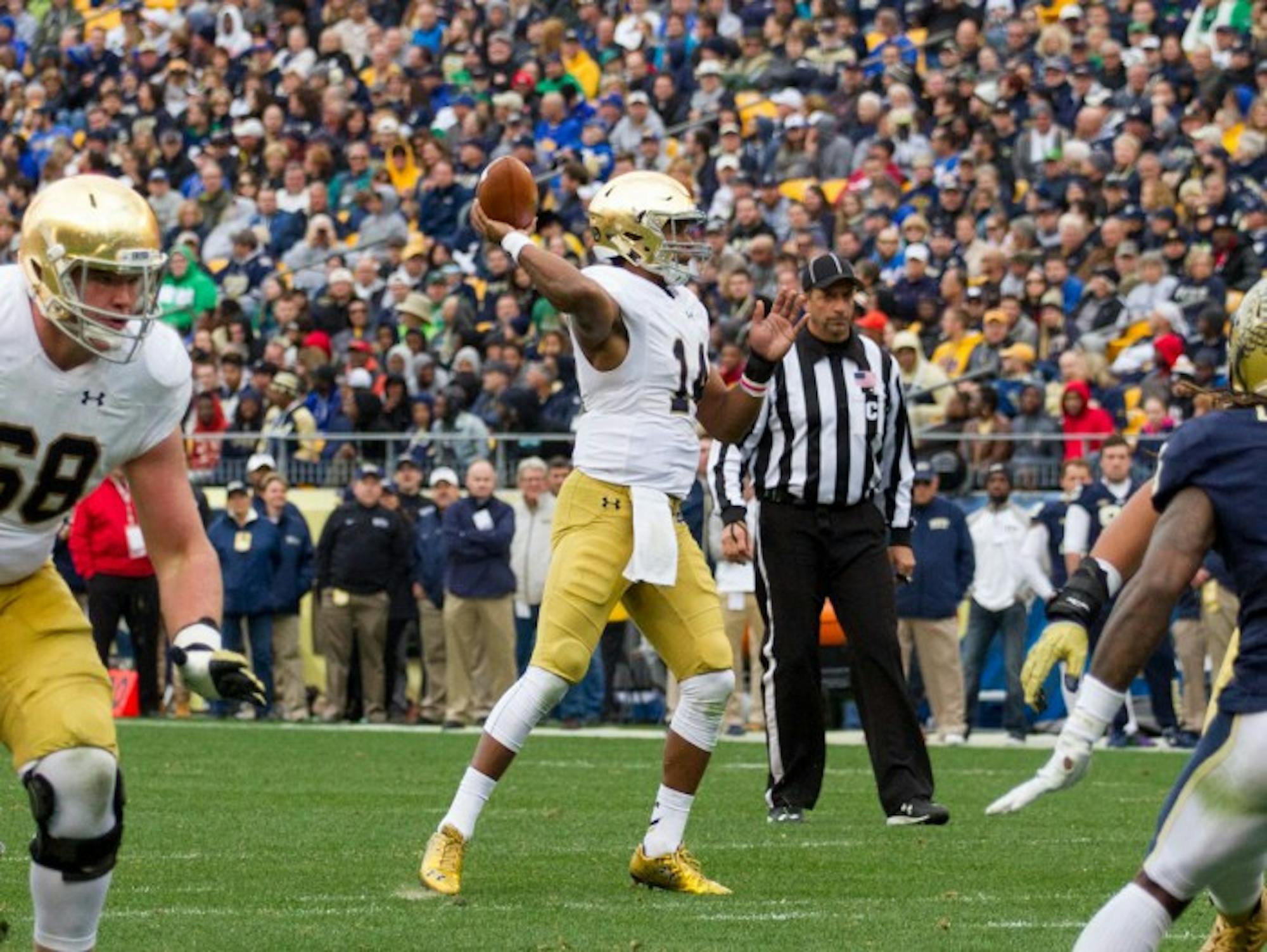 Sophomore quarterback DeShone Kizer drops back to pass during Notre Dame’s 42-30 victory over  Pittsburgh on Saturday at Heinz Field. Kizer accounted for all six Irish touchdowns in the win.