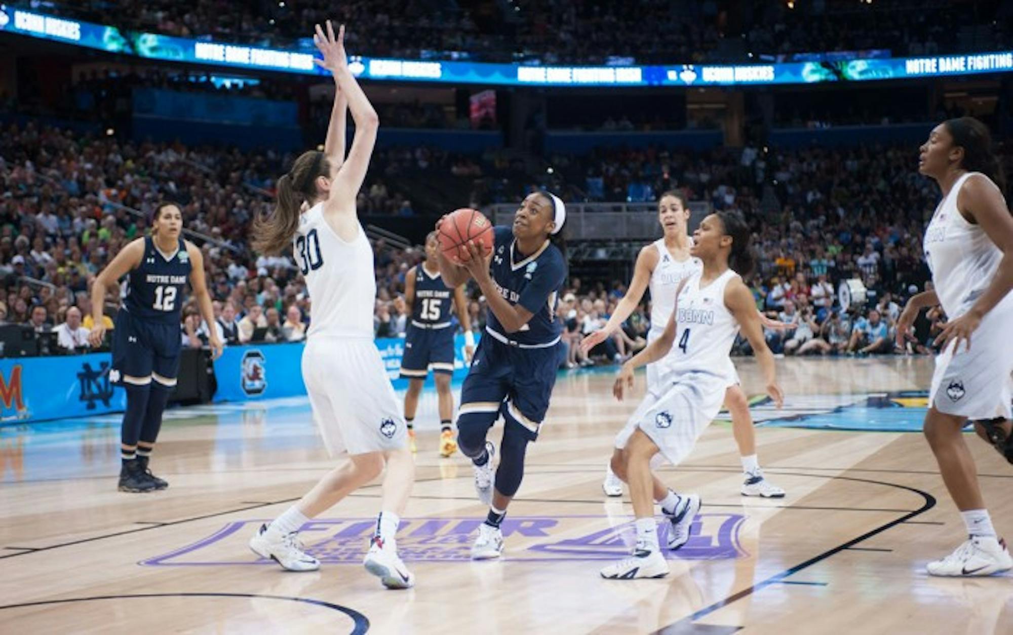 Junior guard Jewell Loyd drives the lane during Notre Dame’s 63-53 loss to Connecticut on Tuesday in the national championship game.