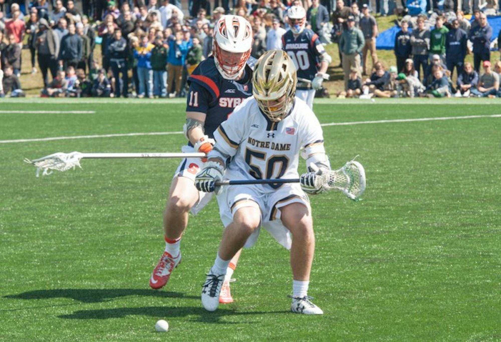 Irish sophomore attack Ryder Garnsey hustles for a ground ball  during Notre Dame’s 11-10 loss to Syracuse on April 1.
