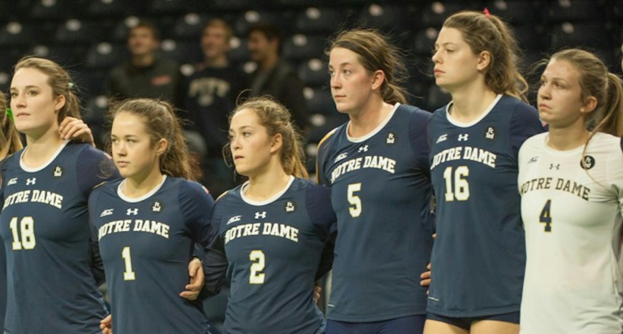 Freshman middle blocker Meg Morningstar stands with her teammates after a 3-0 loss to Pittsburgh at Purcell Pavilion on Nov. 8.