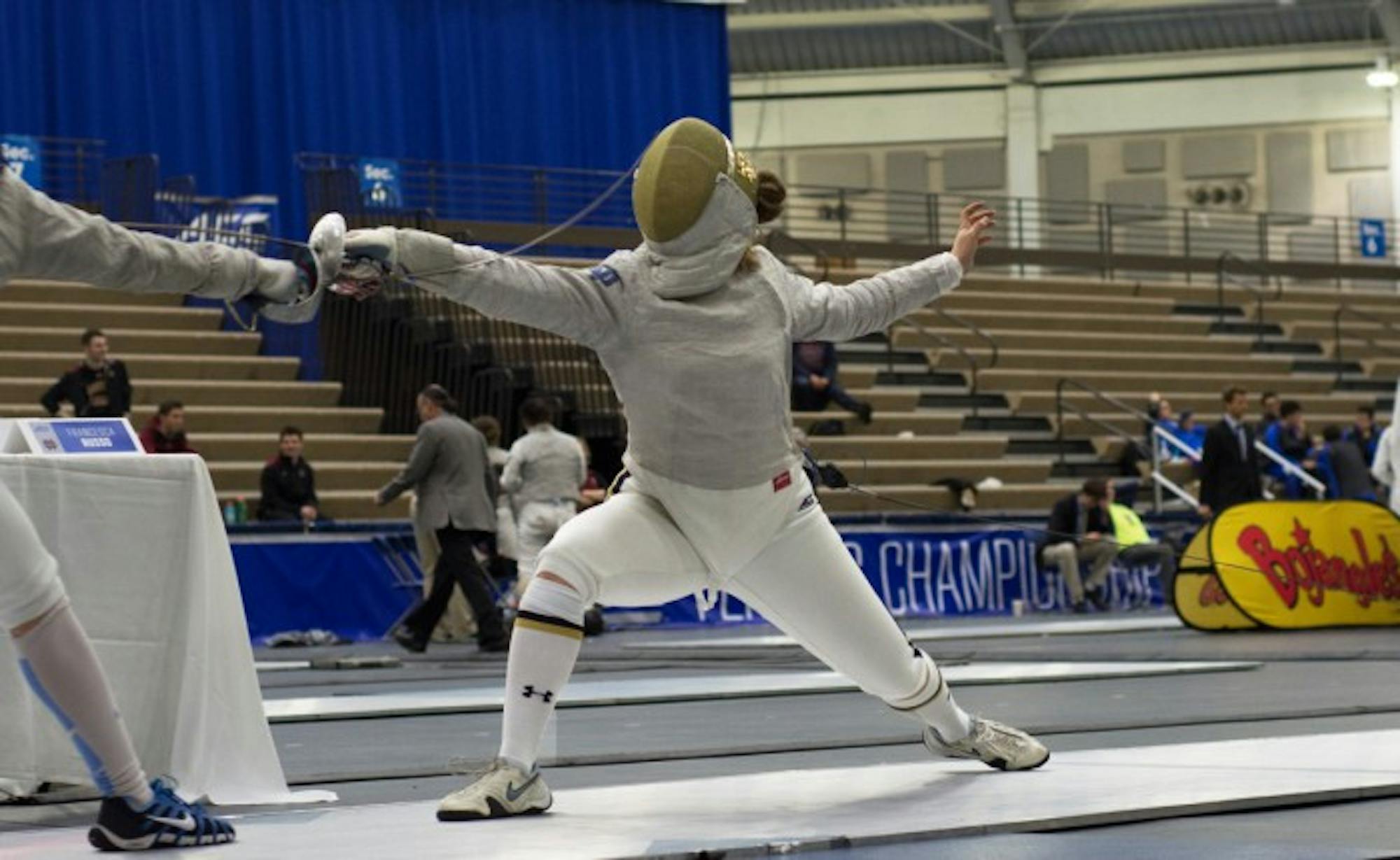Irish junior Francesca Russo lunges at her opponent at the ACC championships on Feb. 27, 2016 at Castellan Family Fencing Center. The Irish women went on to win the event and Russo went undefeated on the day. Russo took home one of Notre Dame’s two individual titles in March.