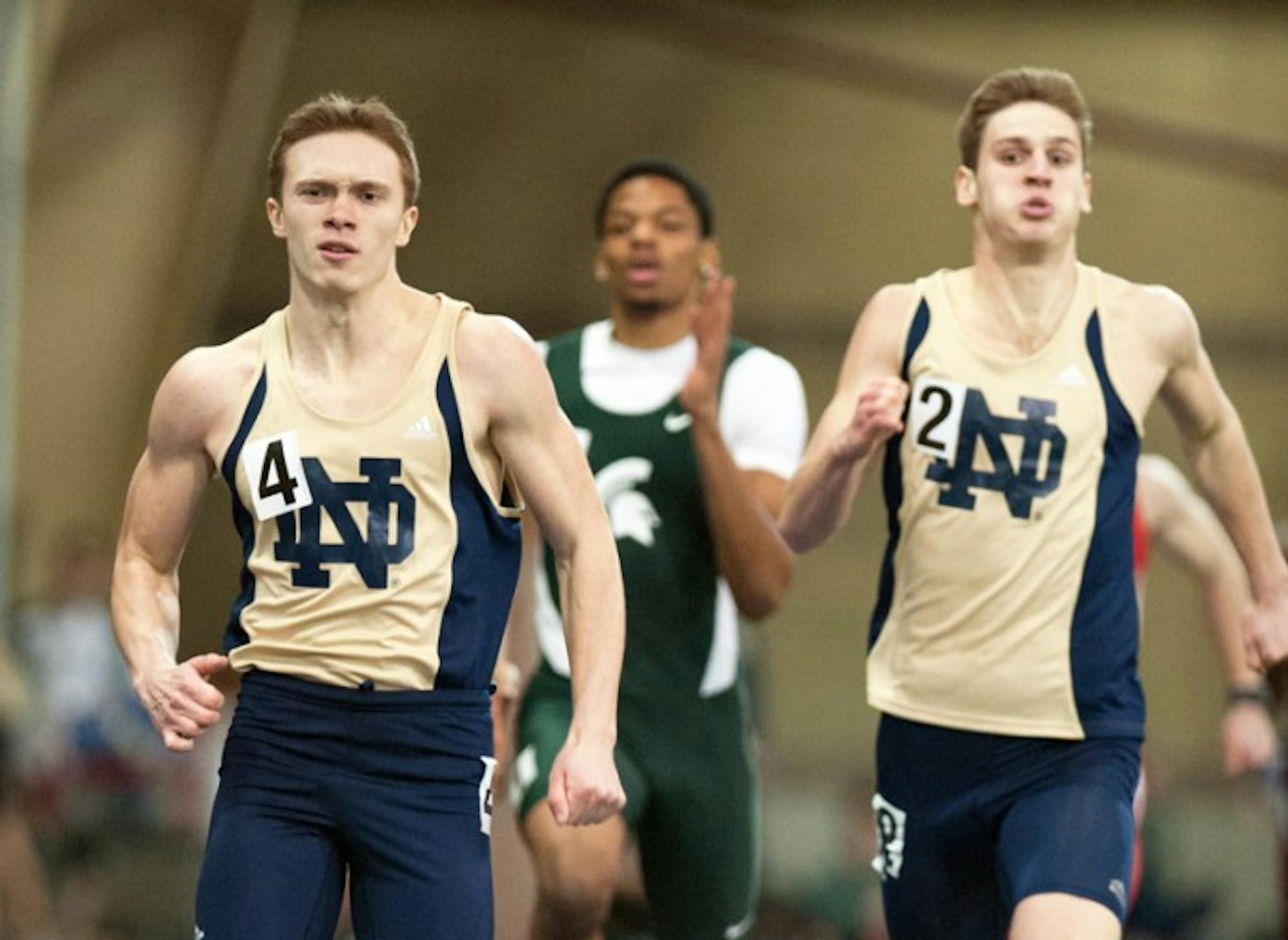 Freshman Harvey Smith, left, runs during the Notre Dame Invitational on Saturday. Smith is one of the Irish freshmen off to a strong start in 2014.