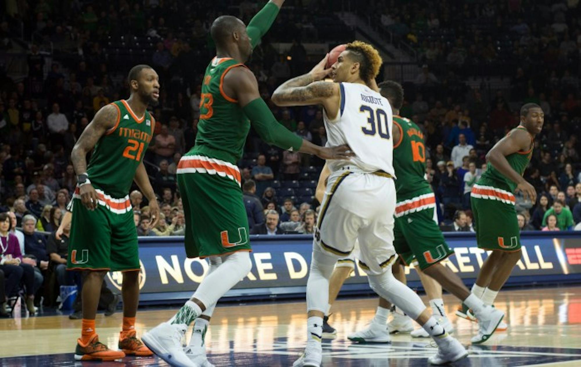 Irish senior forward Zach Auguste looks to score a basket during Notre Dame’s 68-50 loss to Miami (Fla.) on March 2 at Purcell Pavilion. Auguste is among the national leaders in double-doubles with 19.