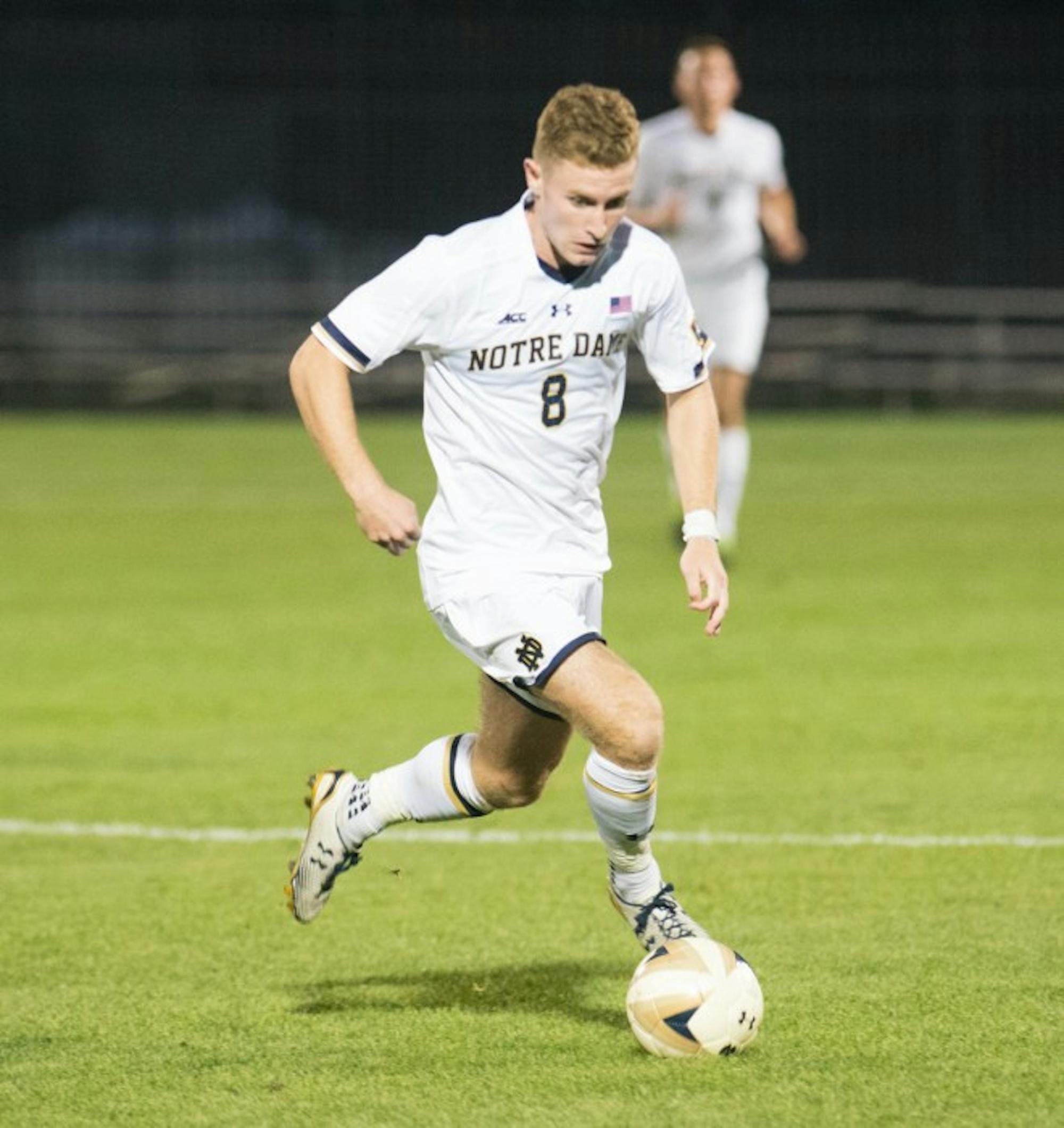 Irish junior forward Jon Gallagher maneuvers across the field in Notre Dame’s 1-0 win in double overtime over Connecticut on Tuesday at Alumni Stadium. Gallagher scored the game-winning goal against the Huskies in the second overtime period.