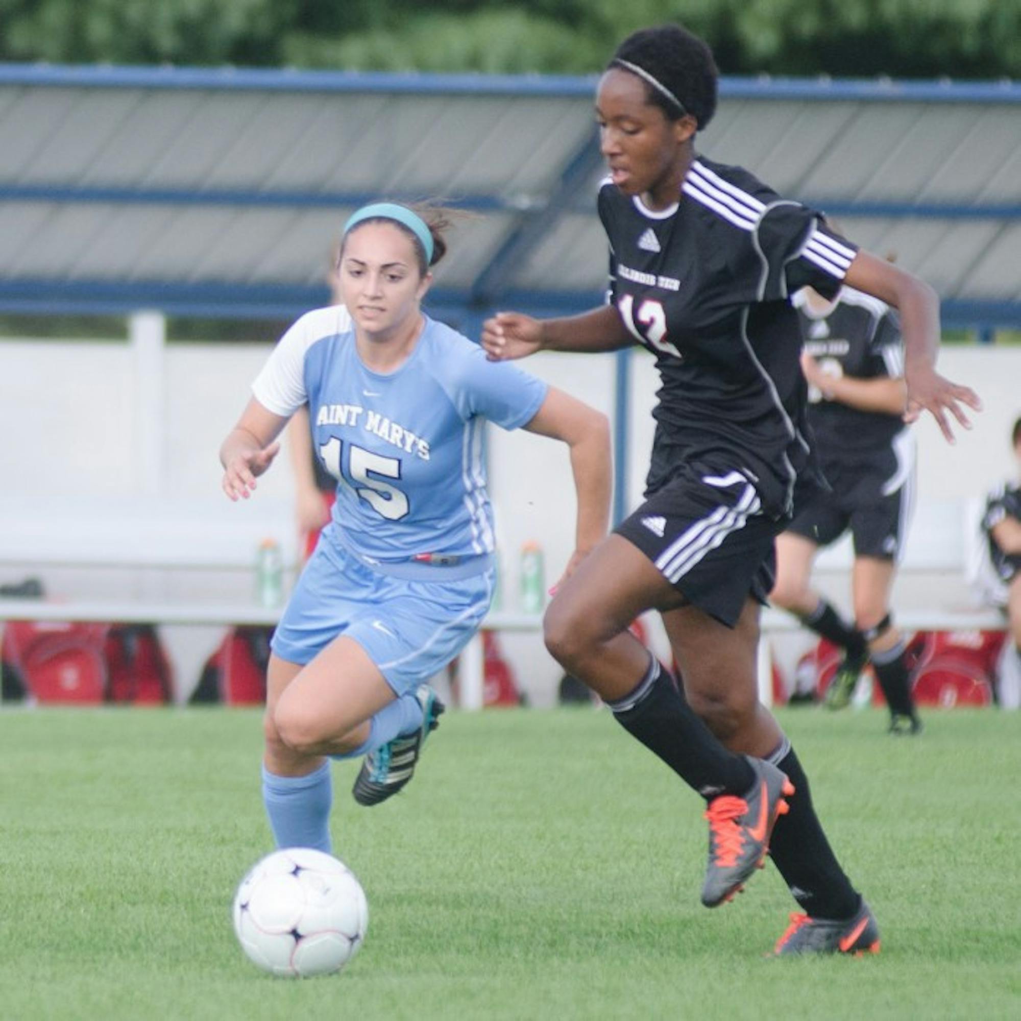 Saint Mary’s senior midfielder tracks down an Illinois Tech player during the Belles’ 4-1 win on Sept. 2, 2013.