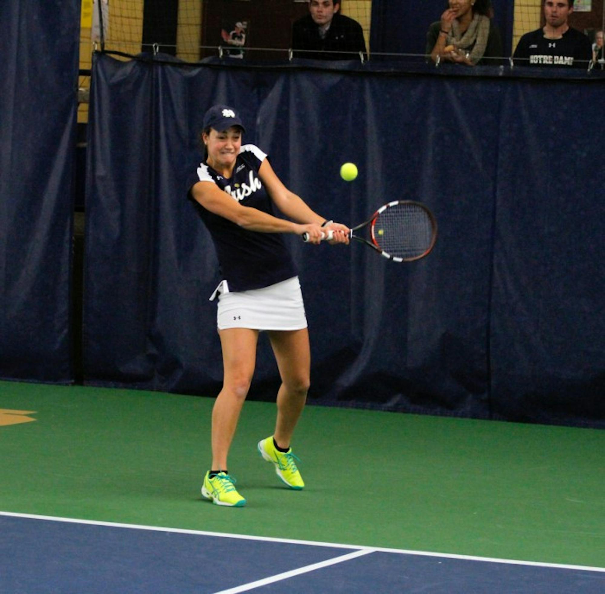 Senior Quinn Gleason returns the ball in her 6-1, 6-0 victory over Western Michigan’s Olivia Meyers Wednesday at Eck Tennis Pavilion. The Irish swept the Broncos in all seven matches.
