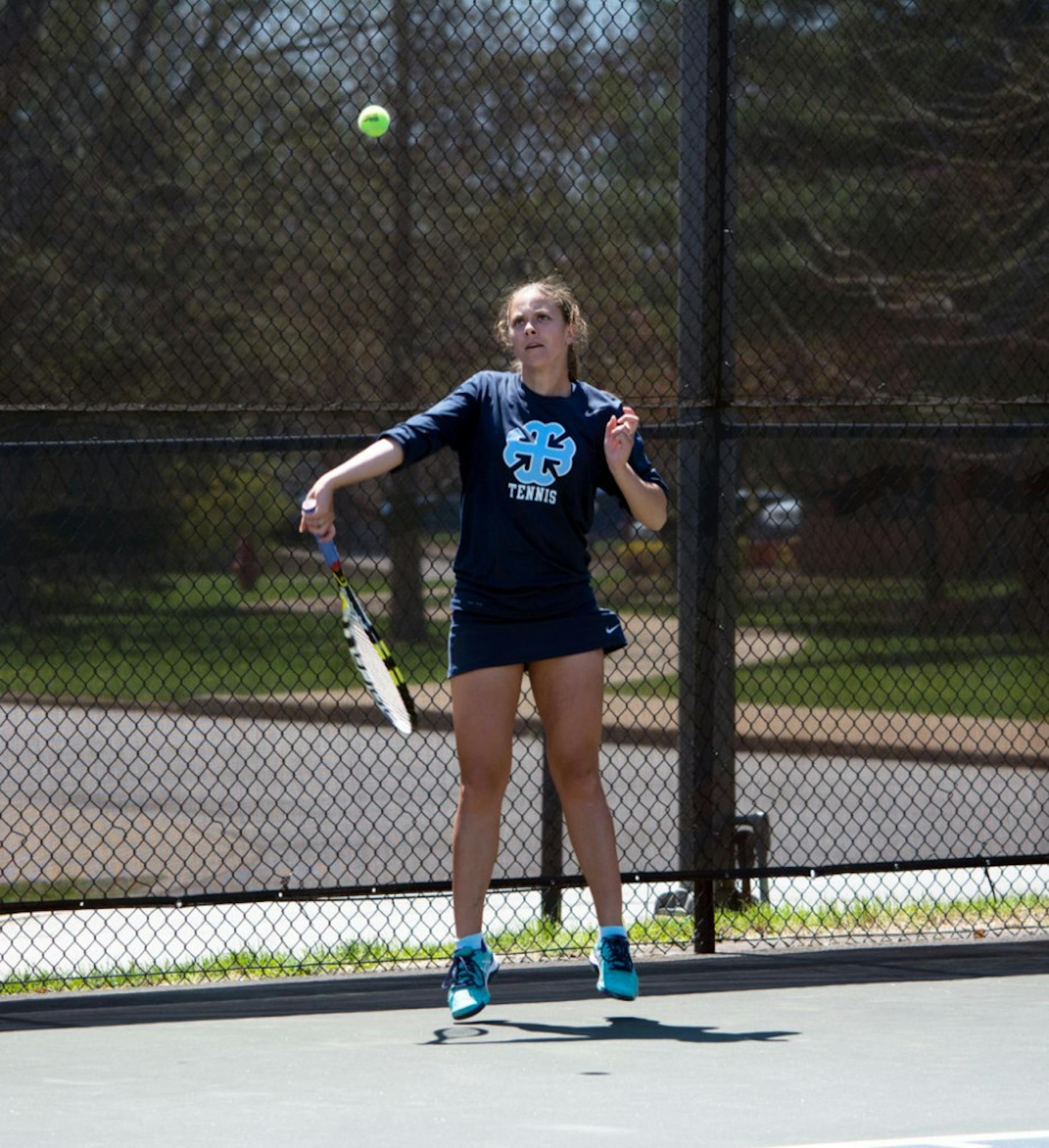 SMC senior captain Andrea Fetters hits a forehand in Saint Mary’s’ 9-0 shutout of Concordia (Mich.) on April 23 at Angela Tennis Courts.