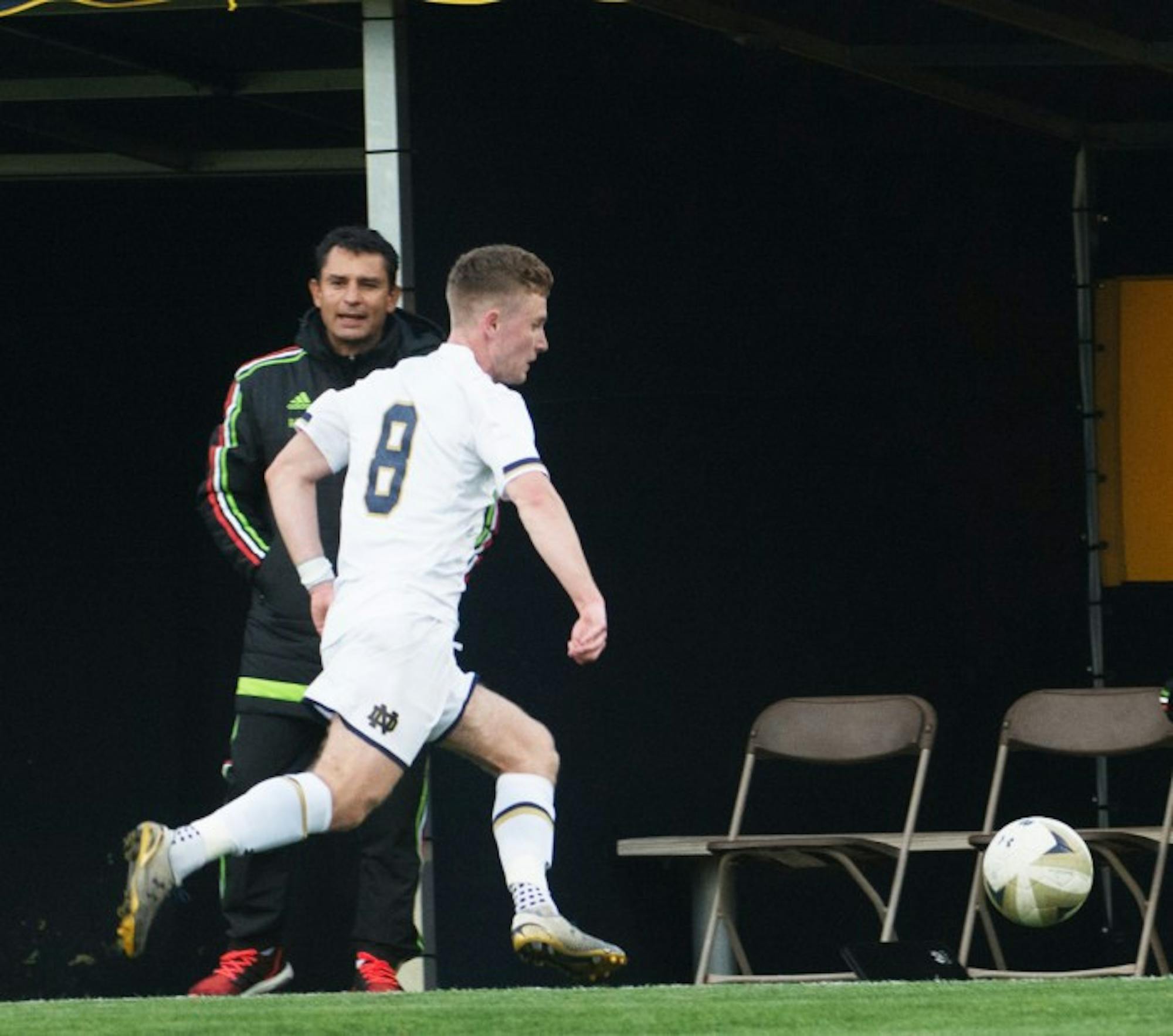 Irish senior forward Jon Gallagher tracks down the ball during Notre Dame’s 5-0 victory over the Mexico U-18s on April 28 at Alumni Stadium. Gallagher led the team in goals and assists last season.