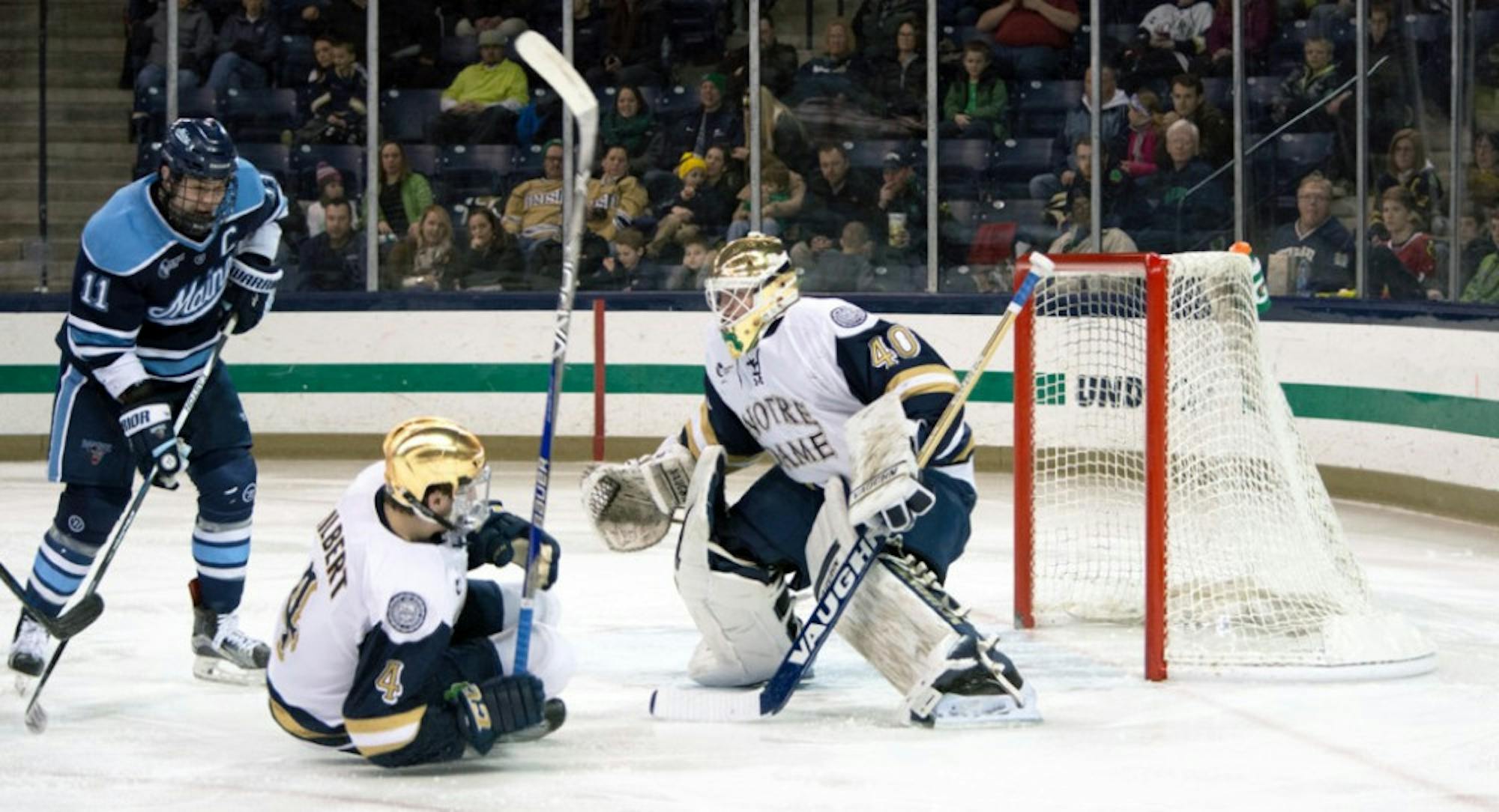 Irish sophomore goalie Cal Petersen looks through traffic during Notre Dame’s 5-1 win over Maine on Feb. 13 at Compton Family Ice Arena. Petersen posted a .927 save percentage on the season.