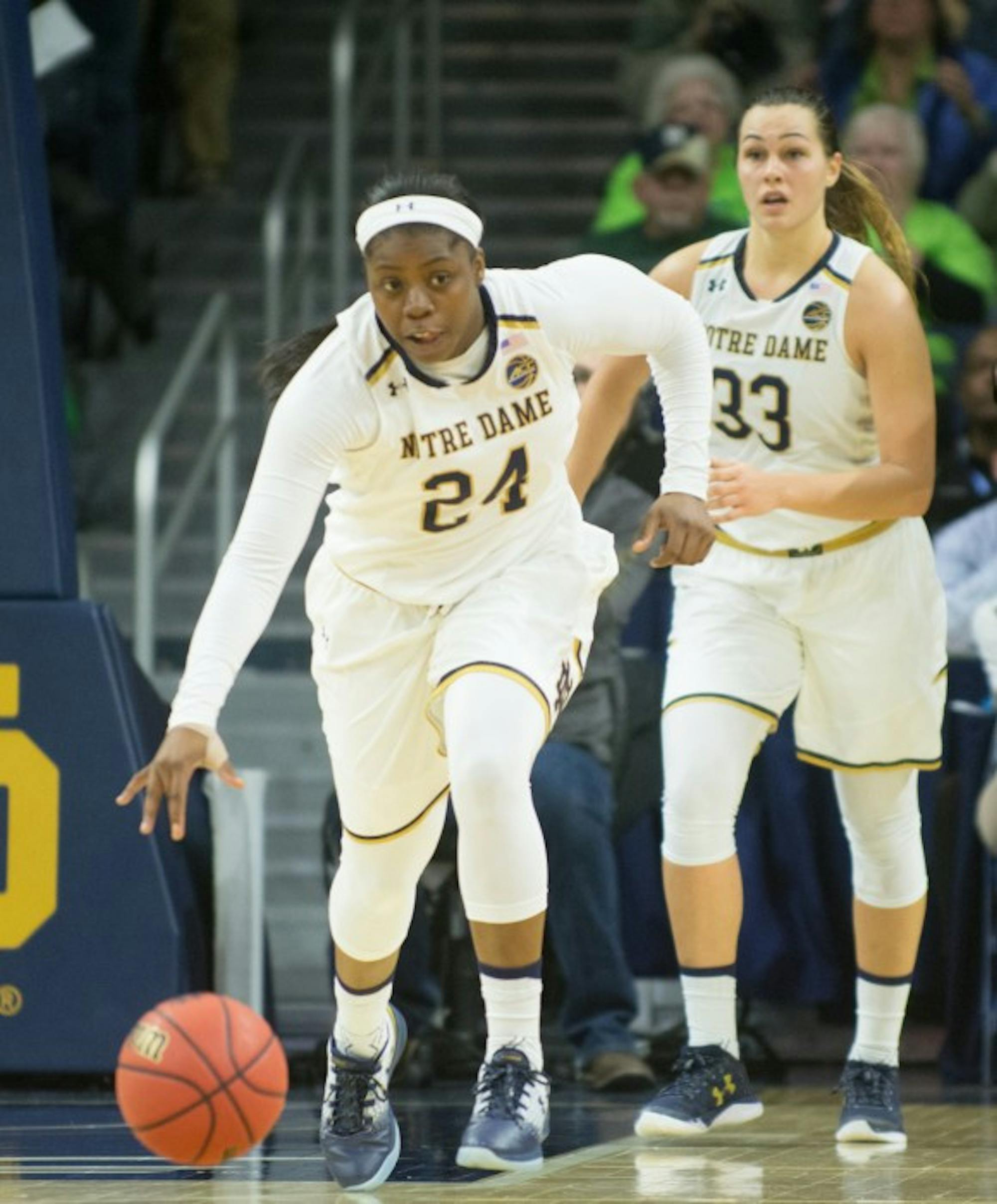 Irish sophomore guard Arike Ogunbowale dribbles the ball up the court during Notre Dame's 71-60 win over Washington on Nov. 20 at Purcell Pavilion.